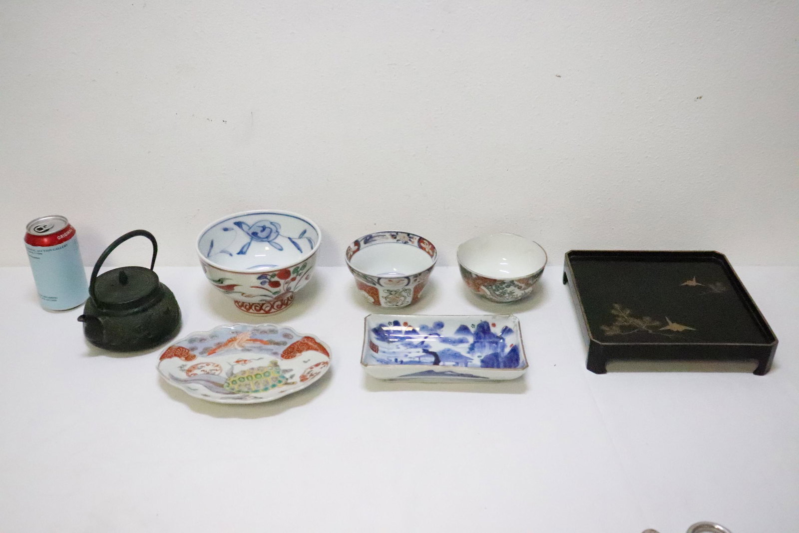 Lot of Japanese items: Lot of Japanese items; including antique imari and kutani porcelain, cast iron teapot (5.8"Hx5.65"x5") and lacquer tray (1.85"Hx9"x9")