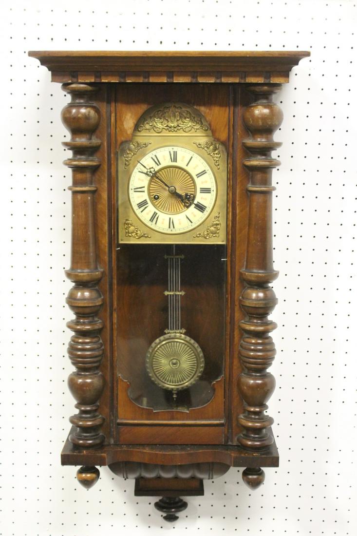 Antique mahogany cased key-wind wall clock (1 of 9)