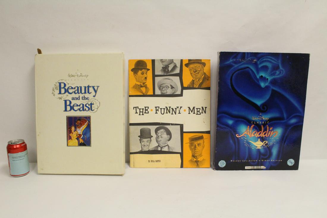 2 collector set of Disney movies, and a portfolio (1 of 10)