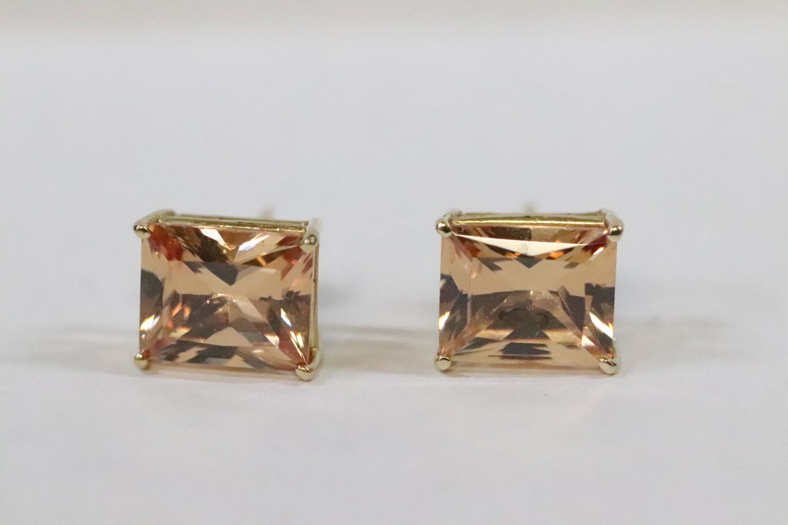 Pair 14K Y/G earrings set with orange color stones (1 of 10)