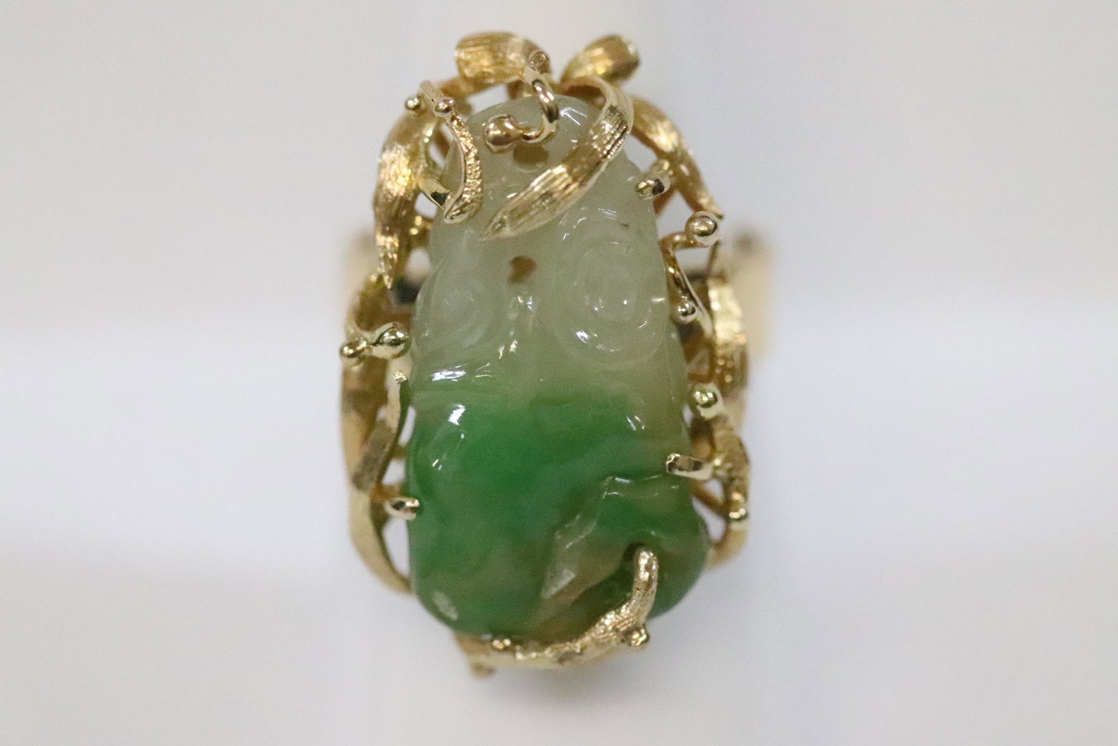 A heavy 14K rose gold jadeite ring (1 of 10)