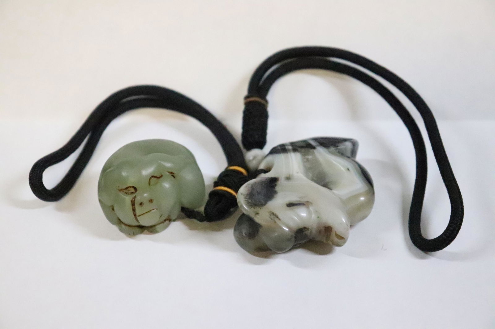 2 jade like stone carved ornaments (1 of 11)