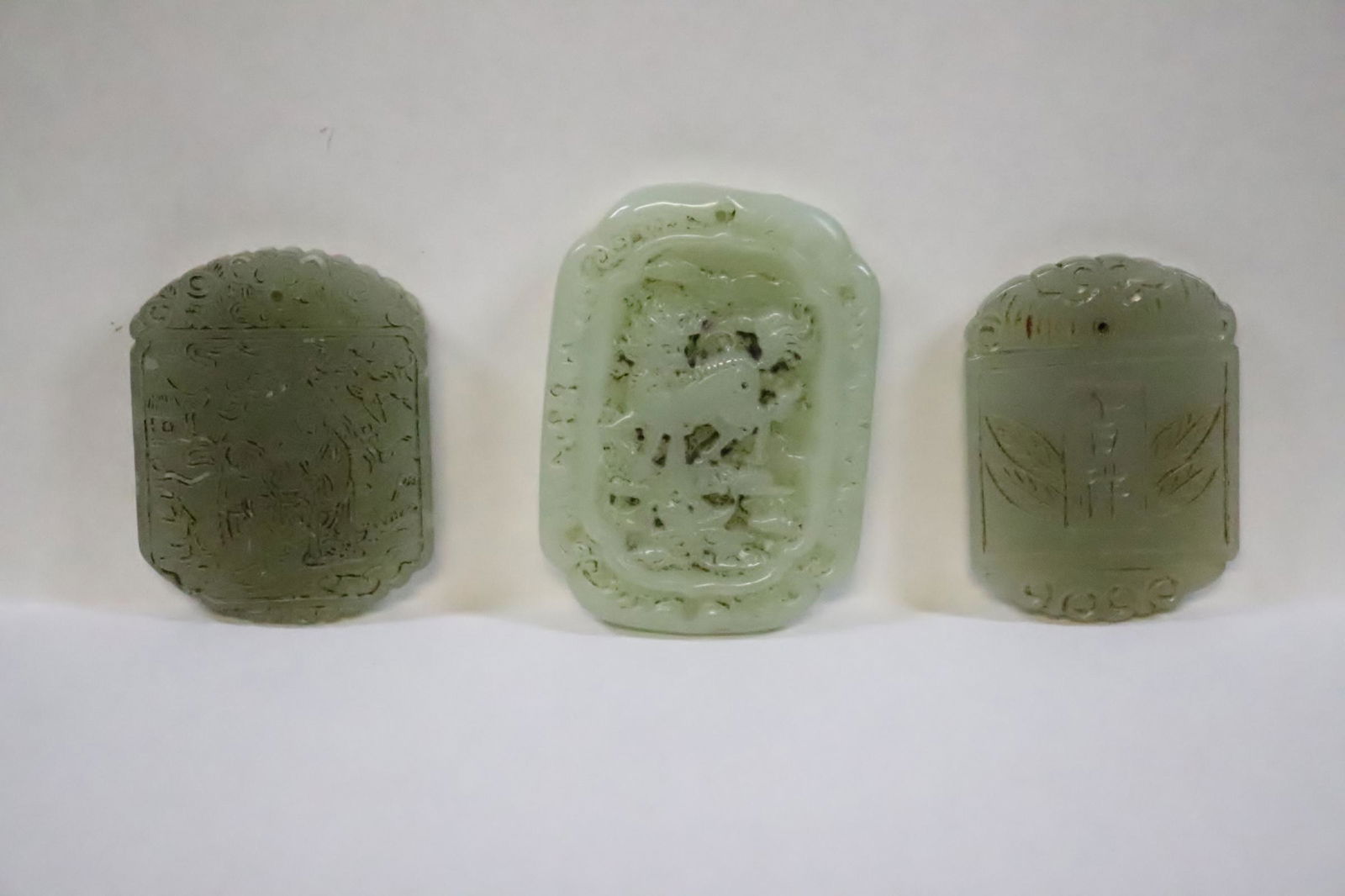 3 celadon jade carved plaques (1 of 10)