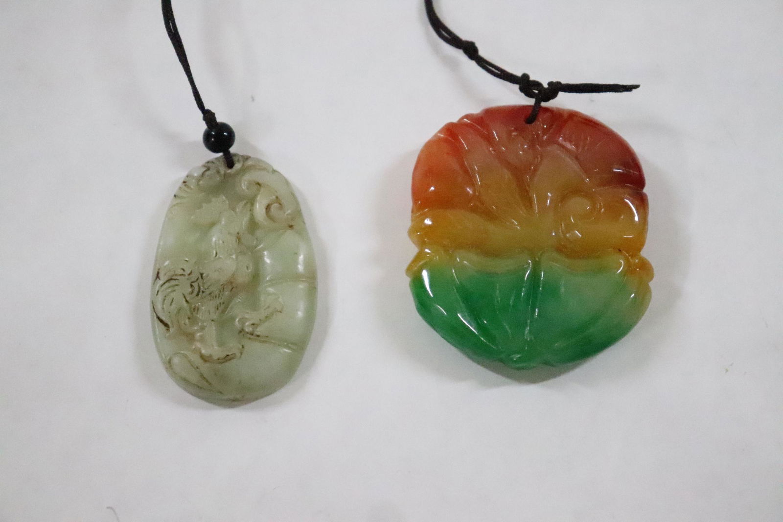 2 jade/ jadeite like stone carved ornaments (1 of 9)