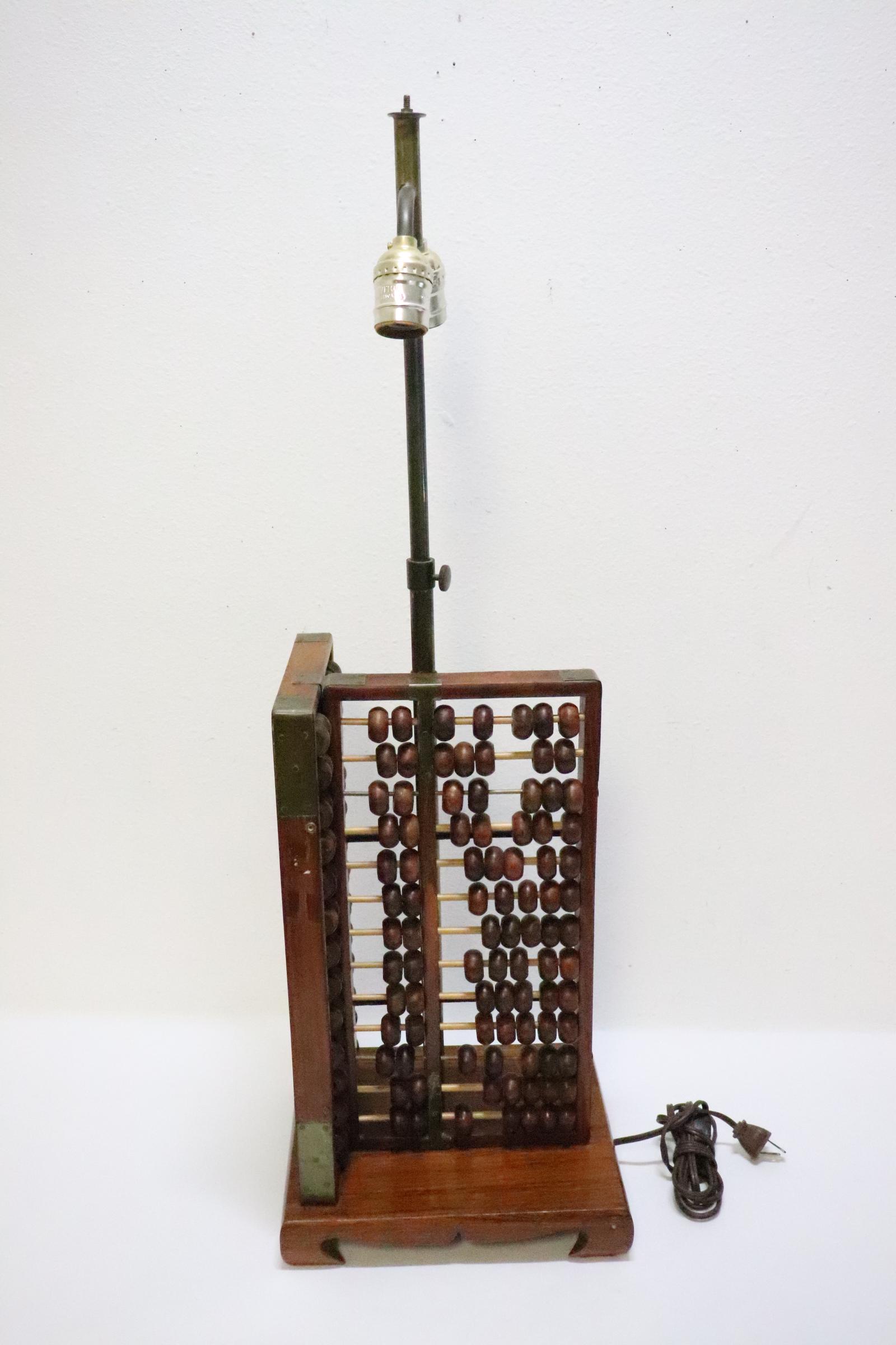 Chinese rosewood based lamp with 2 abacus: Chinese rosewood based lamp (31"H) with 2 abacus (14.63"H)