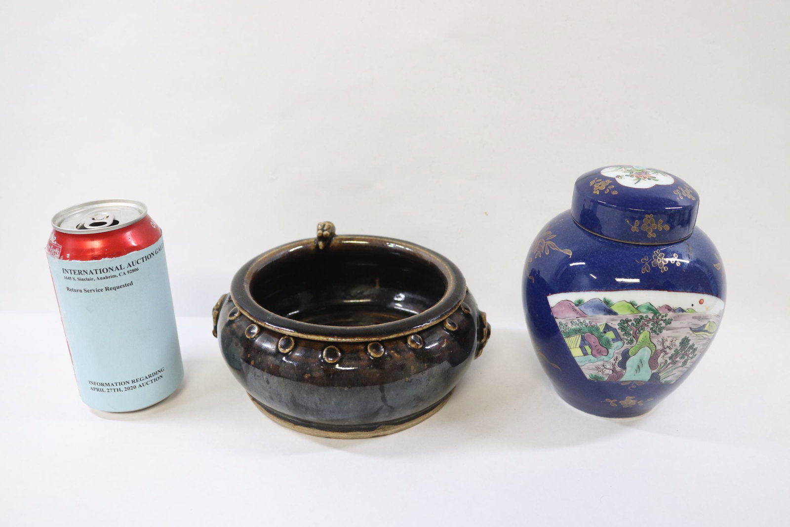 Chinese brush wash and a Chinese covered jar: Chinese brown glazed brush wash (3.5"Hx7"x6.5") and a Chinese blue background famille rose covered jar (cover repair, 5.75"Hx4.75"dia)