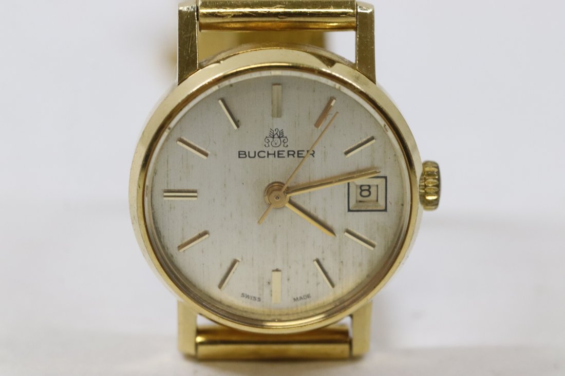 18K Y/G Bucherer watch w/ original 18K band: A beautiful lady's 18K Y/G Bucherer automatic wrist watch with original 18K Y/G band, wt. 35gm