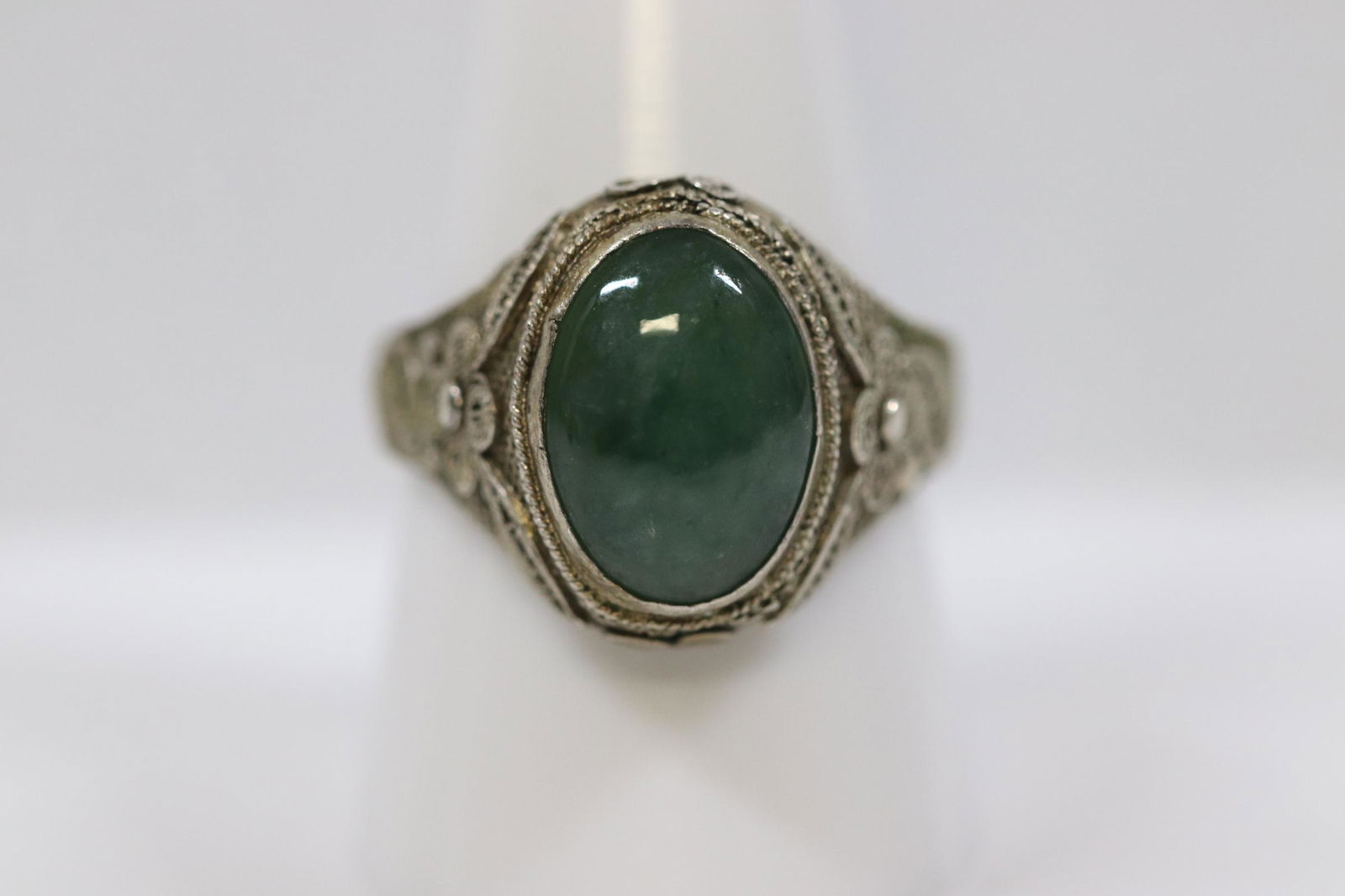 Chinese antique silver jadeite ring: Chinese antique silver ring, center a jadeite cabochon measures approx. 13.5x10mm, size 9