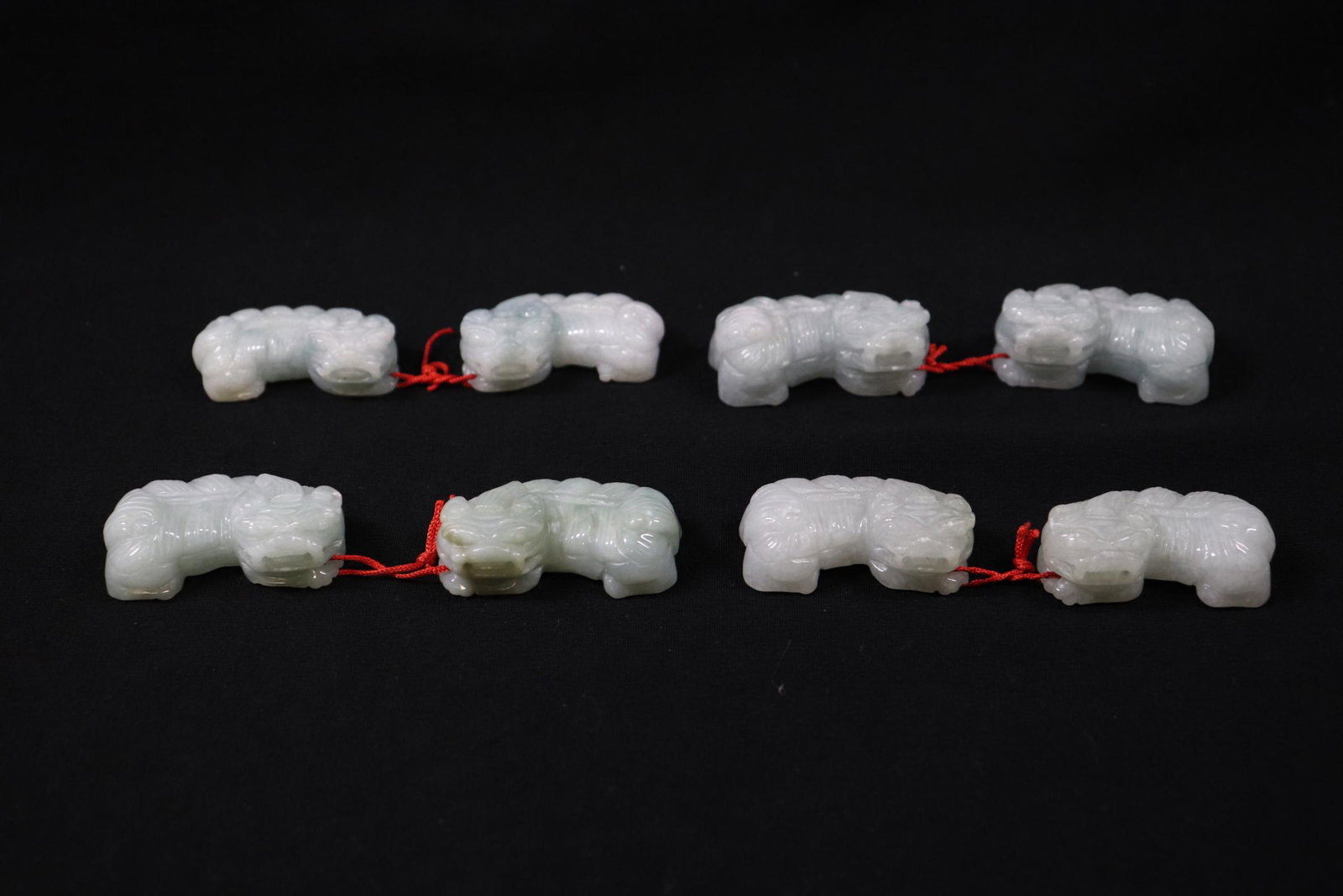 8 Chinese jadeite carved qilin: 8 Chinese jadeite carved qilin, 1.63"x1"x0.6" each