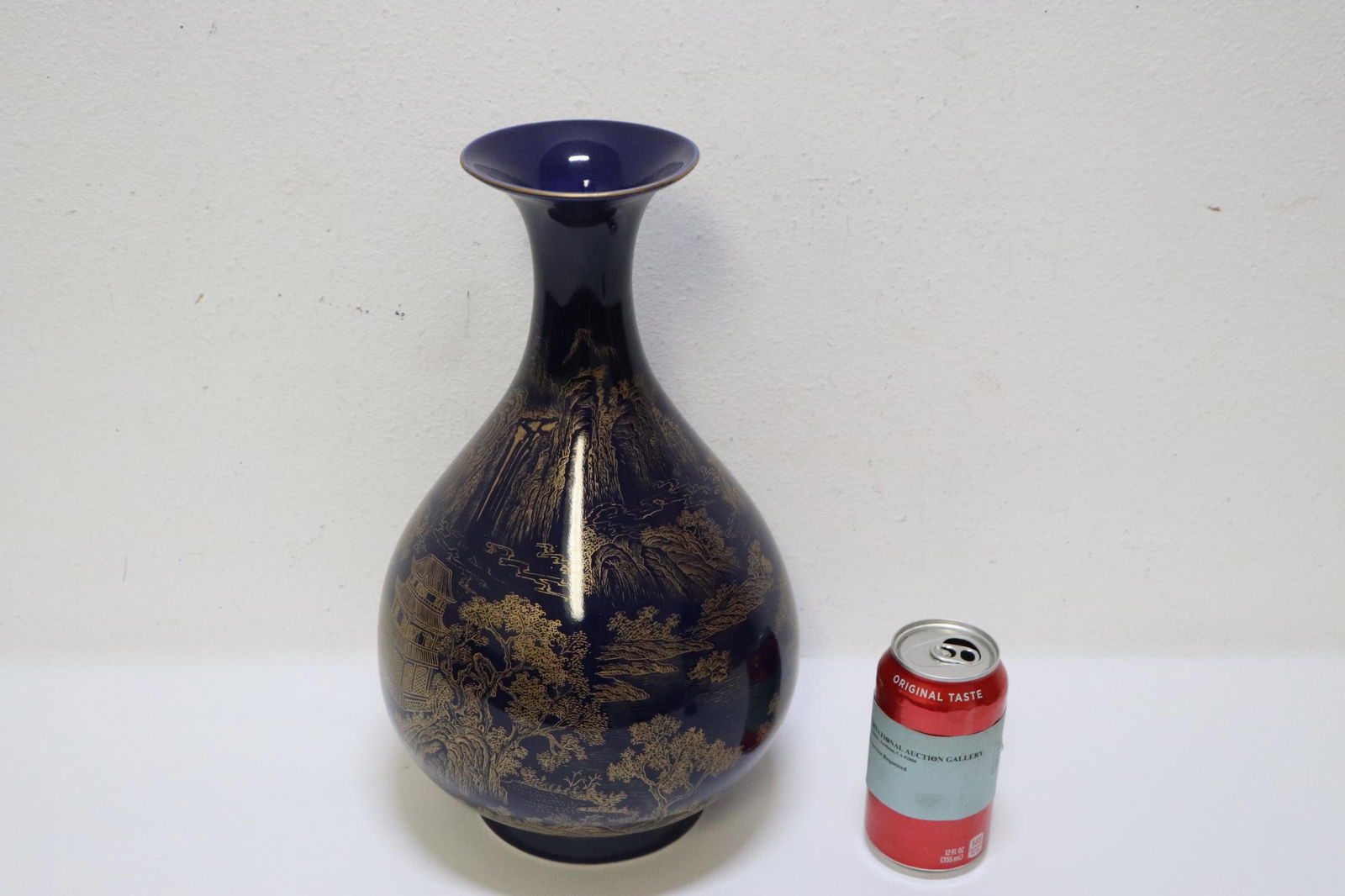 Chinese gold on blue porcelain bottle vase: Chinese gold on blue porcelain bottle vase, 14.25"Hx8"dia