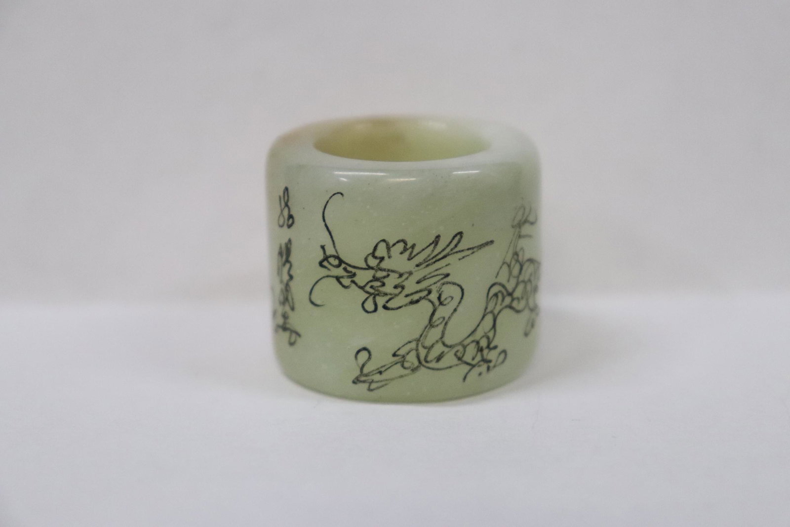 Chinese jadeite like archer's ring: Chinese jadeite like archer's ring, 1.1"x1.35"dia