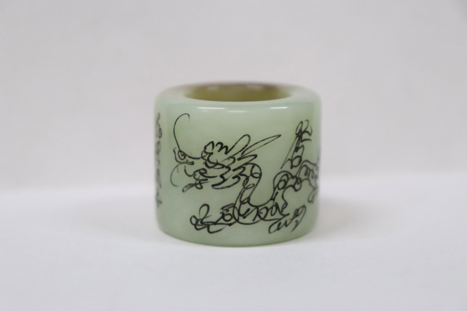 Chinese jadeite like archer's ring: Chinese jadeite like archer's ring, 1.1"x1.25"dia