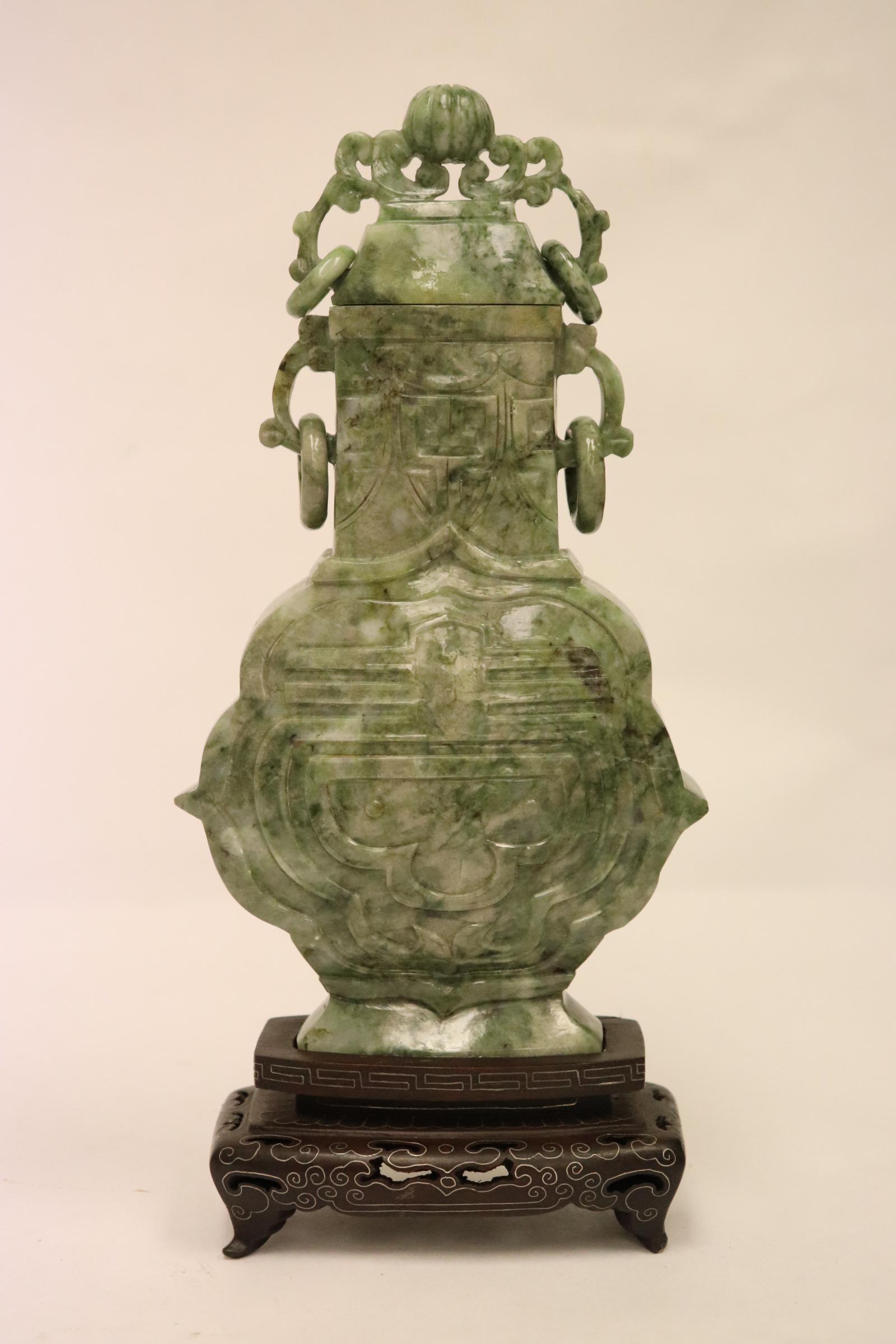 Fine Chinese jadeite carved covered vase: Fine Chinese jadeite carved covered vase, hairline, 7.5"Hx4.15"x1.45"