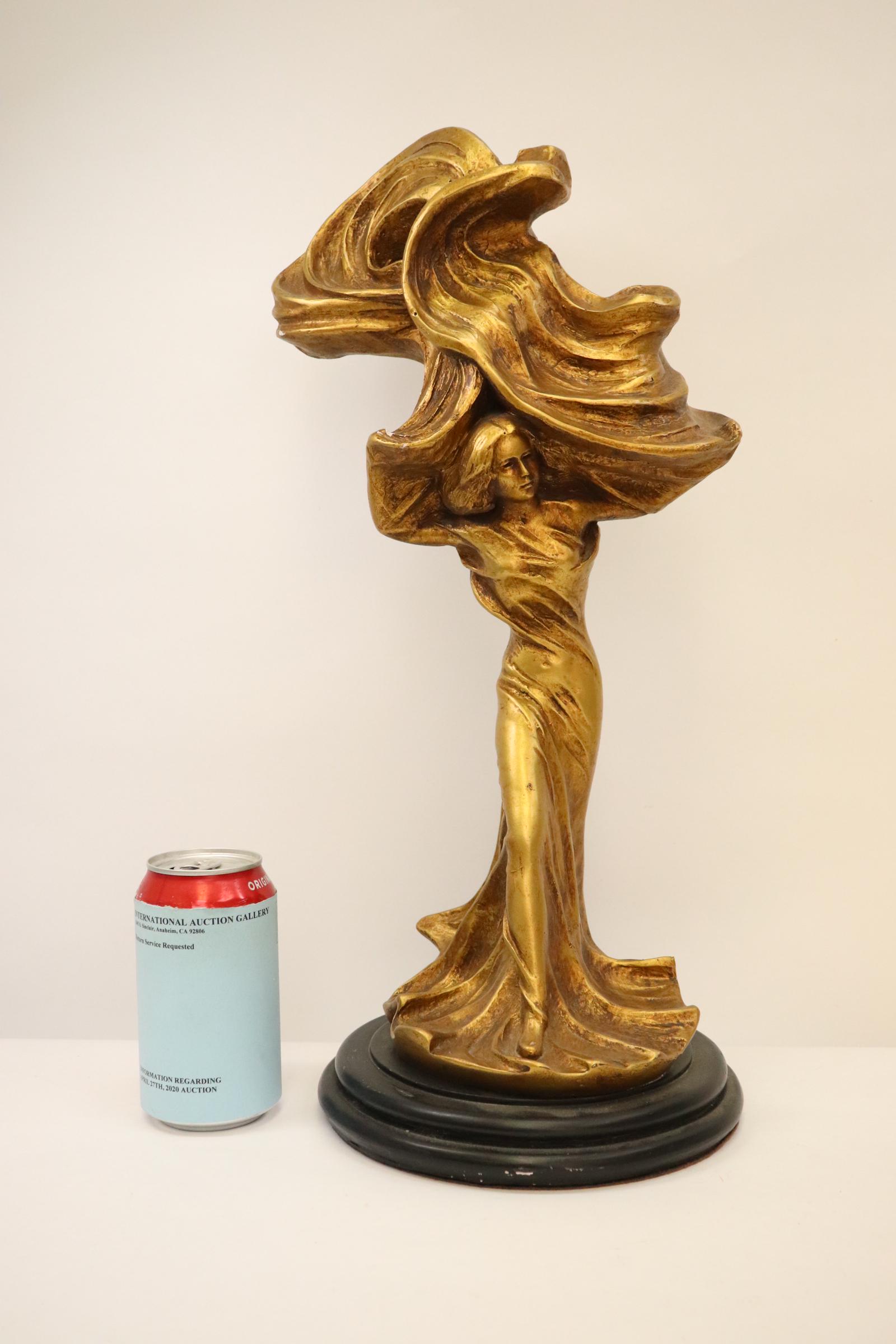 A gold painted plaster ornament (1 of 10)