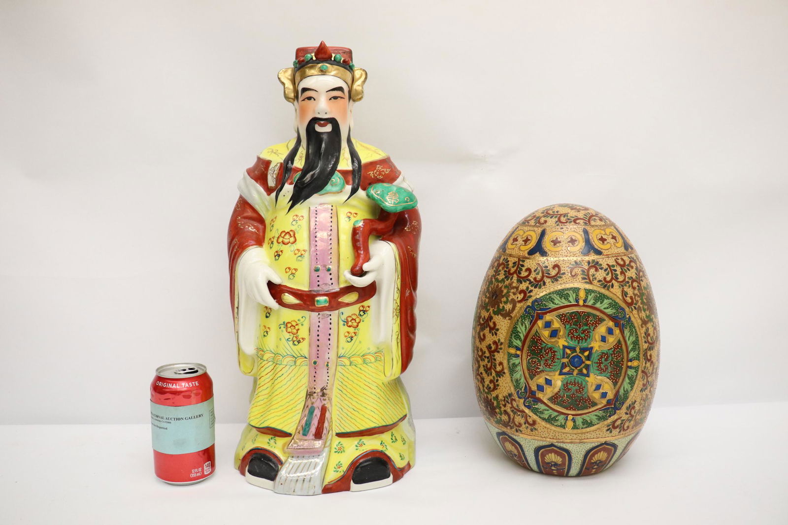 A porcelain egg, and a porcelain deity (1 of 10)