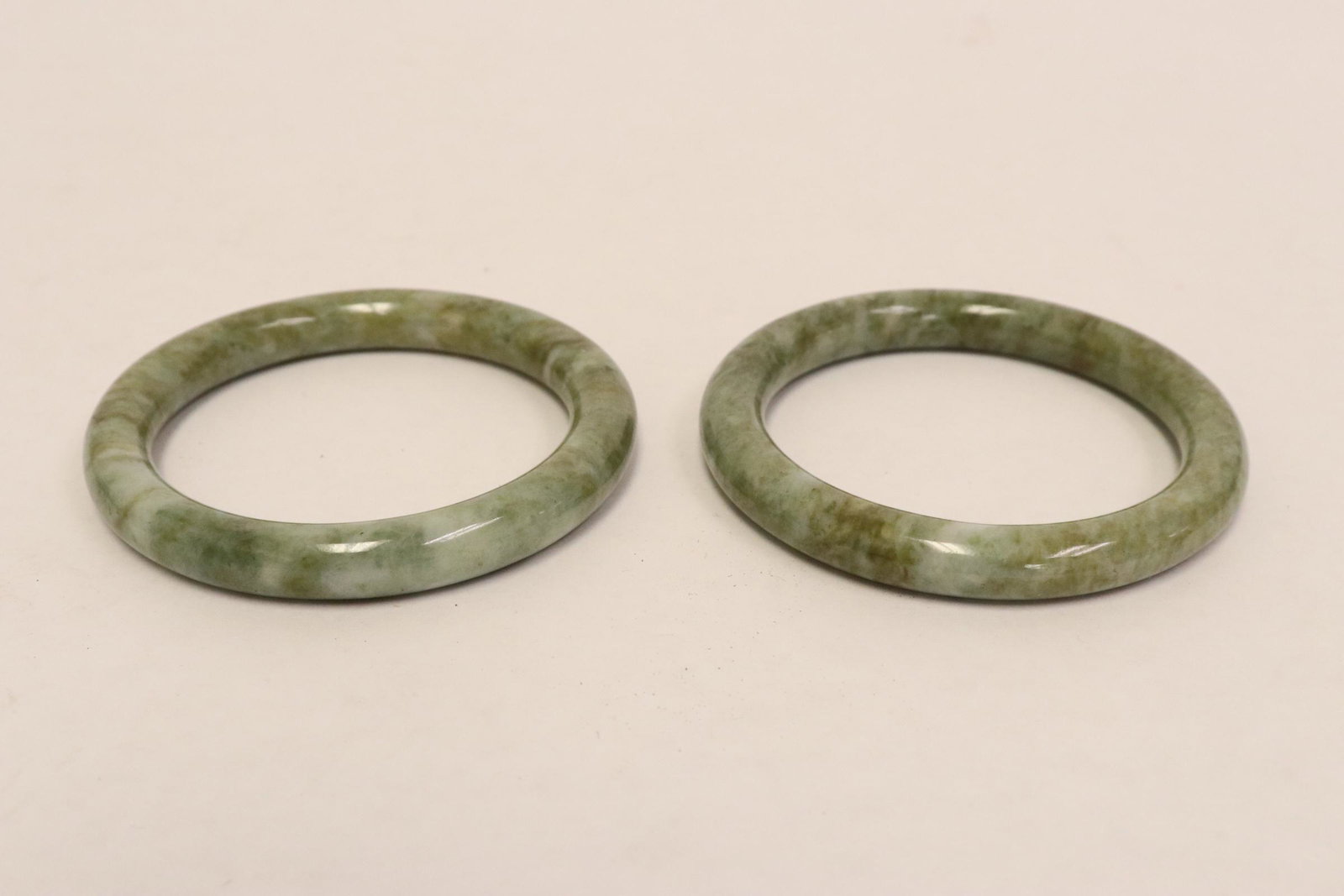 2 Chinese jadeite like bangle: 2 Chinese jadeite like bangle, 0.35"x3"od(2.25"id), 0.4"x3"od(2.25"id)