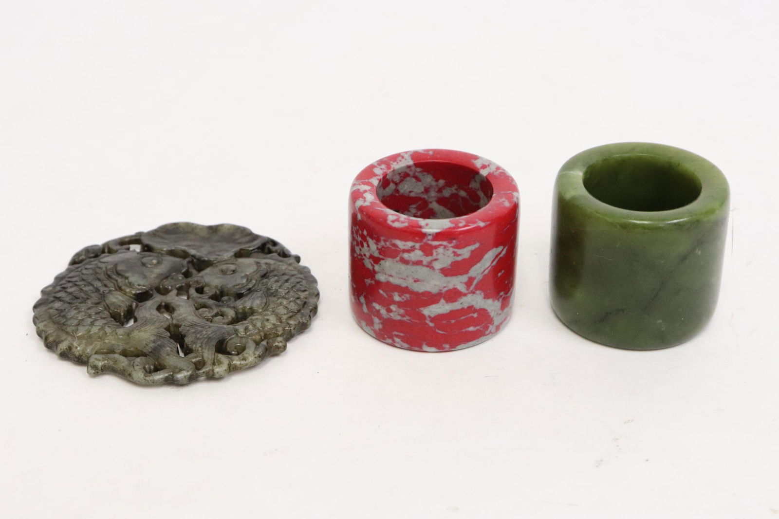 2 Chinese archer's ring & a green jade ornament (1 of 10)