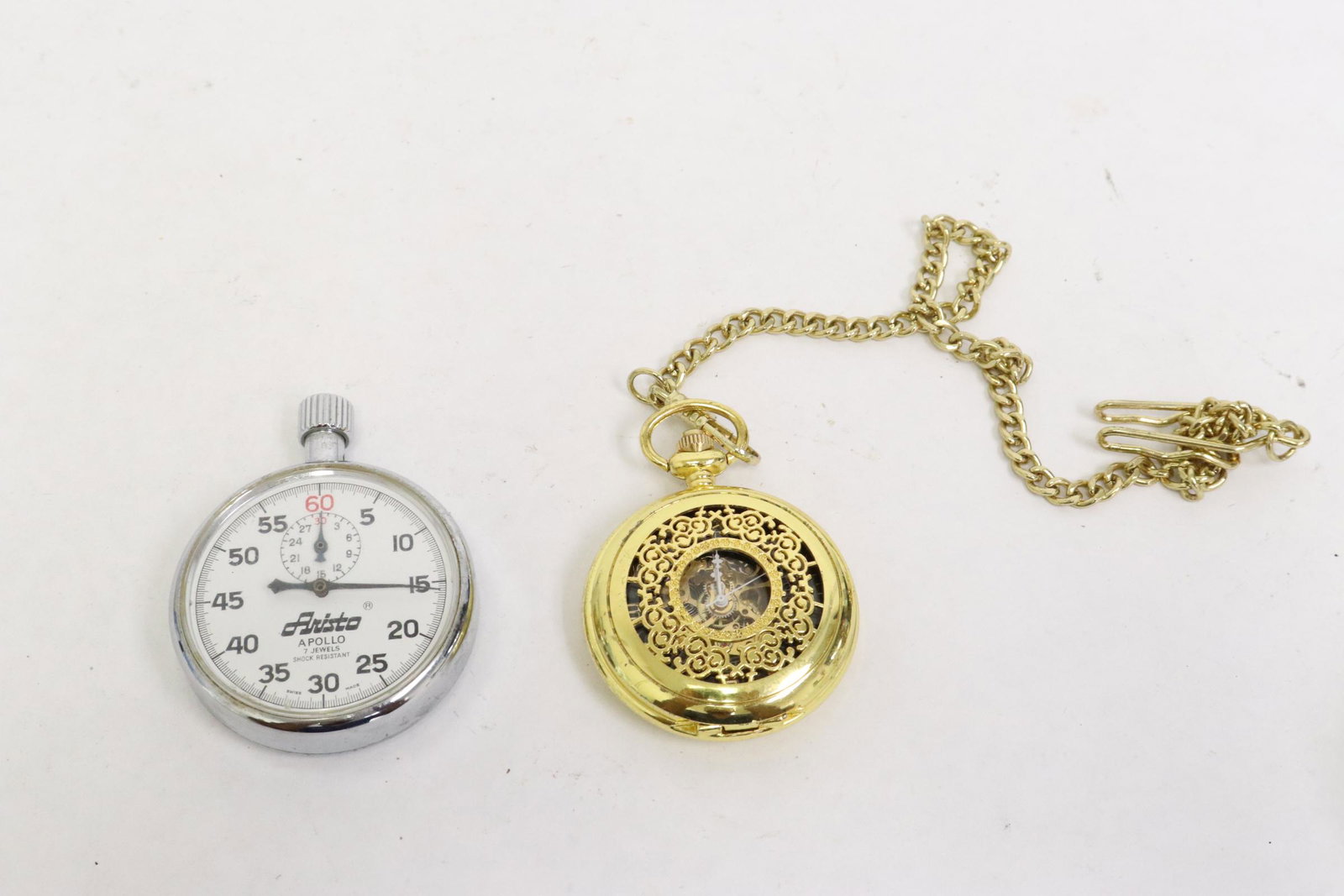A pocket watch and a stopwatch: A pocket watch (1.9"DIA) and a stopwatch (2"DIA)