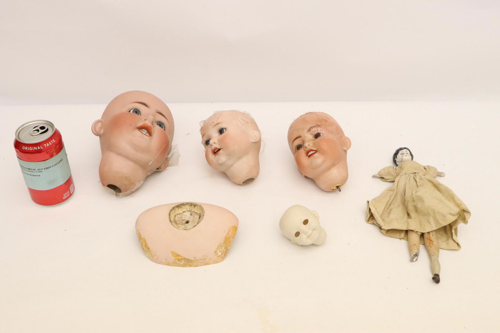 German bisque doll heads, damages (1 of 10)