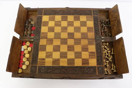 A Persian wood carved chess set & backgammon set: A Persian wood carved chess set and backgammon set with beautifully carved wood board/ case, 3.7"x18.25"x7"