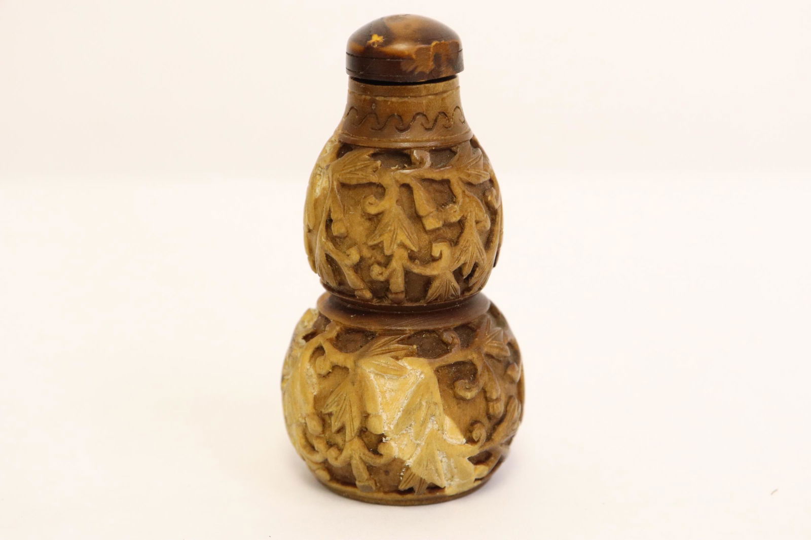 A wood carved snuff bottle (1 of 10)