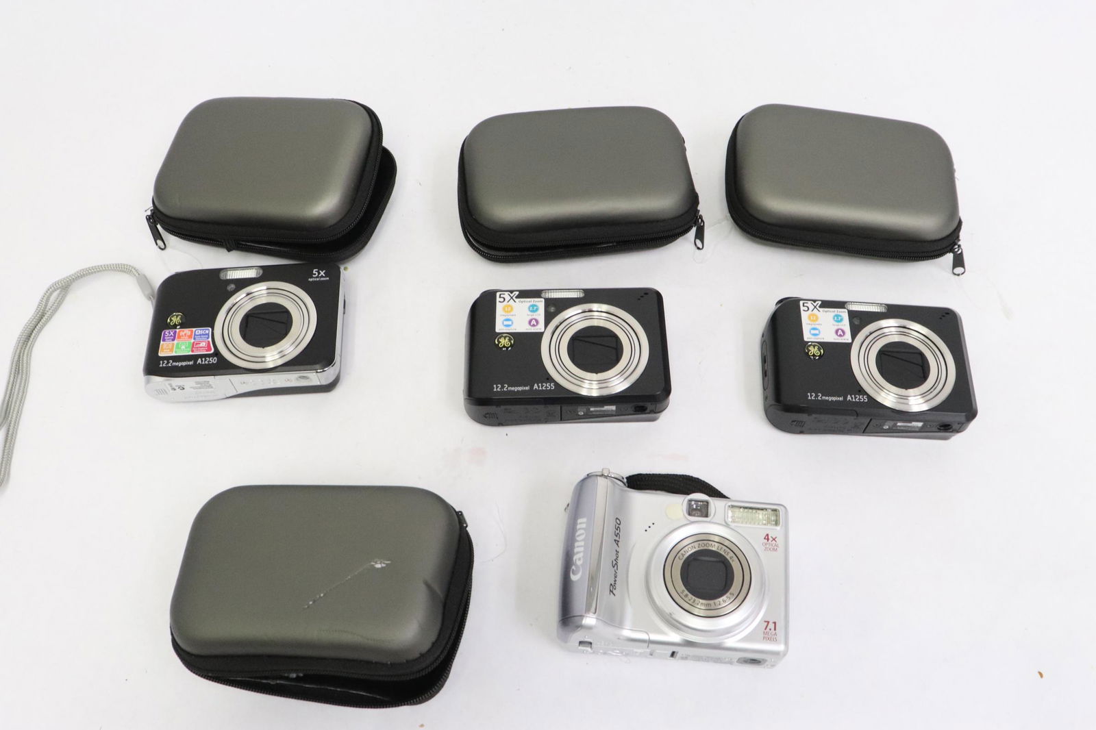 3 GE and one Canon powershot camera (1 of 9)