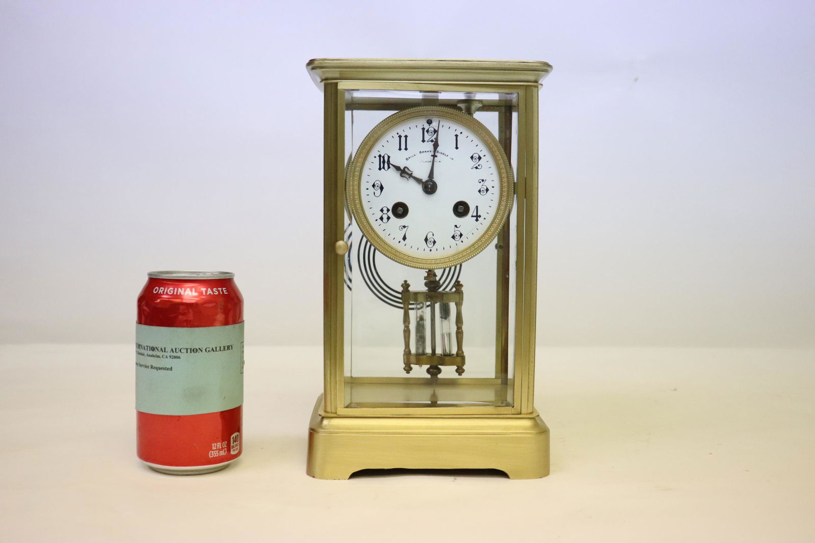 keywind clock by Bailey, Banks and Biddle: A fine keywind clock by Bailey, Banks and Biddle with original mercury pendulum, 10"H