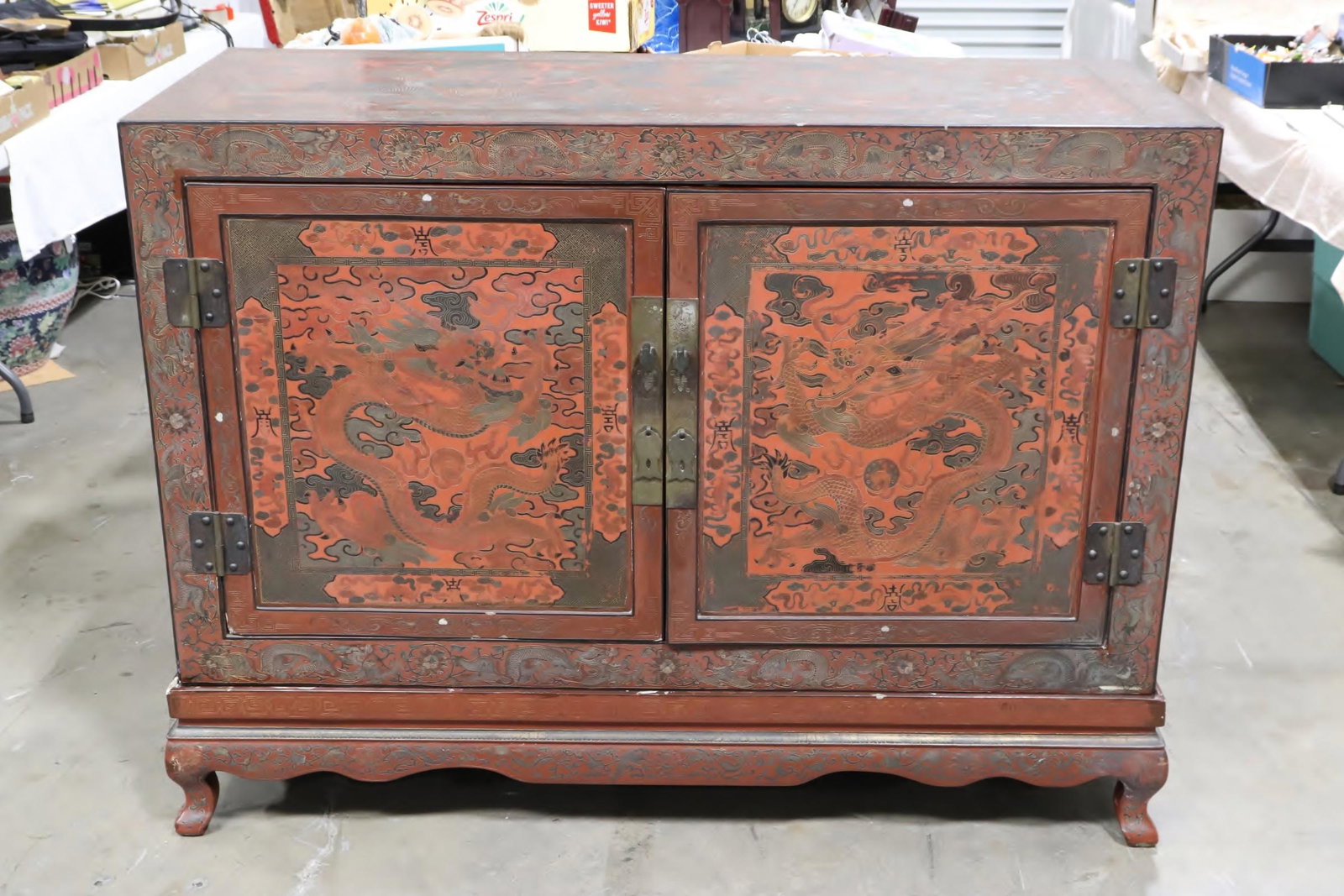 Chinese vintage lacquer cabinet with stand: Chinese vintage lacquer cabinet with stand decorated with dragons, 44.75"hX61"X25.1"