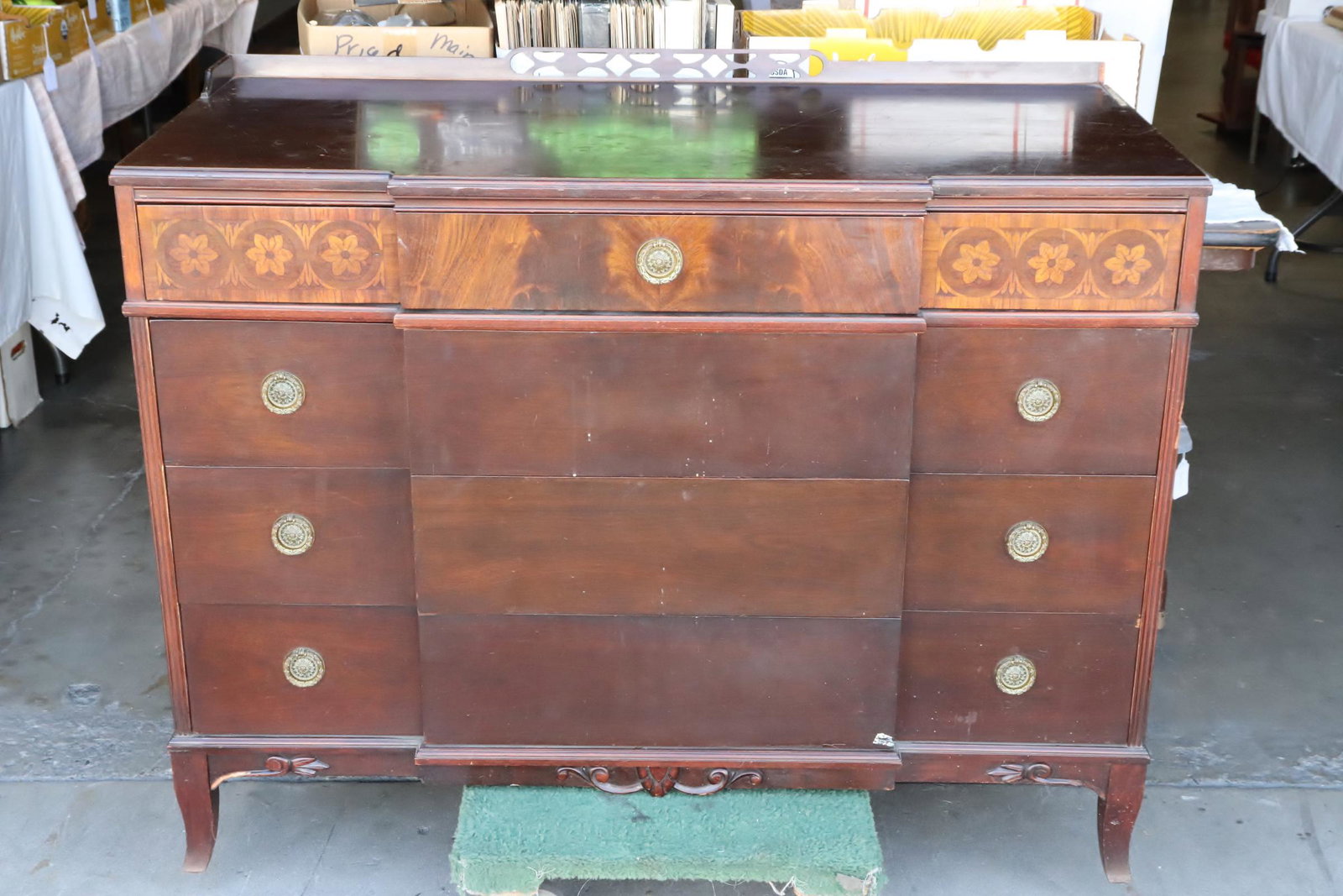 A mahogany early 20th c. inlaid chest of drawers (1 of 11)