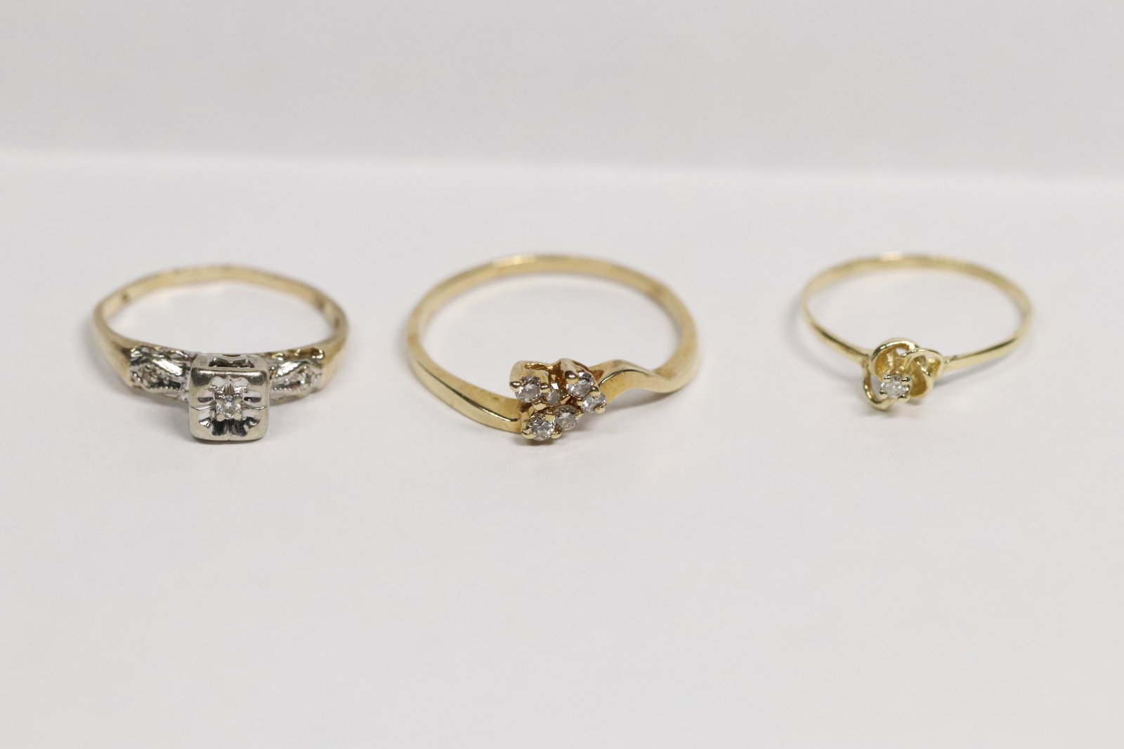 Two 14K and one 10K ring with small diamonds (1 of 12)