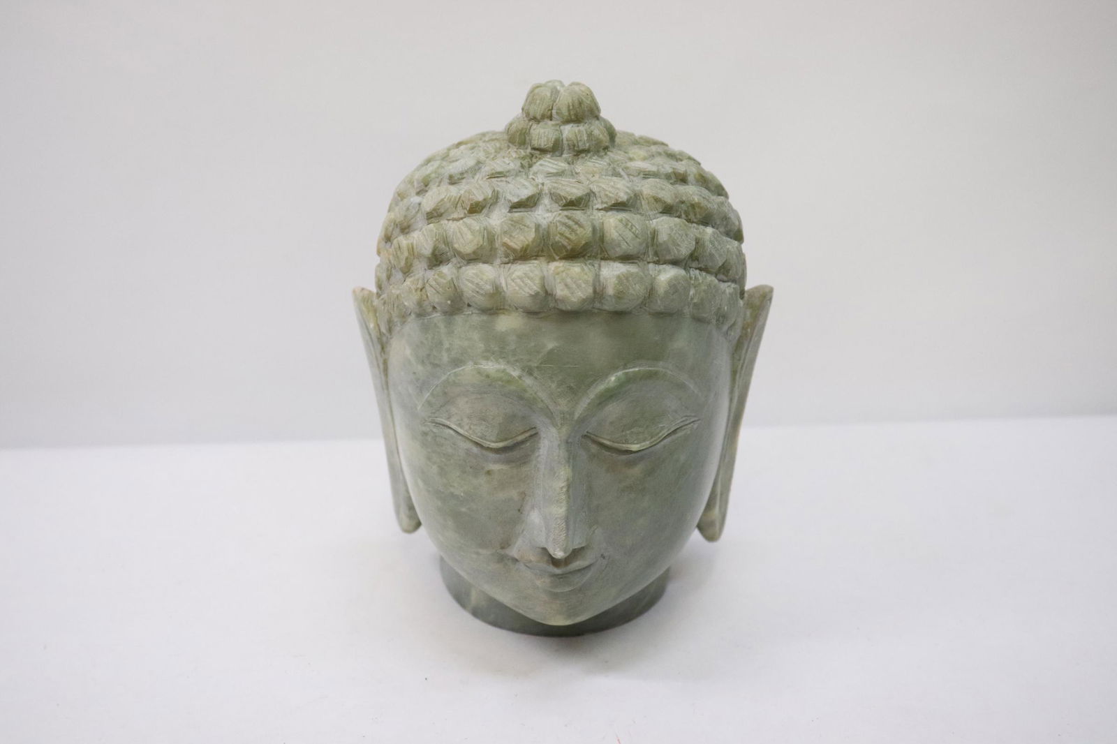 Fine marble carved Buddha head (1 of 10)