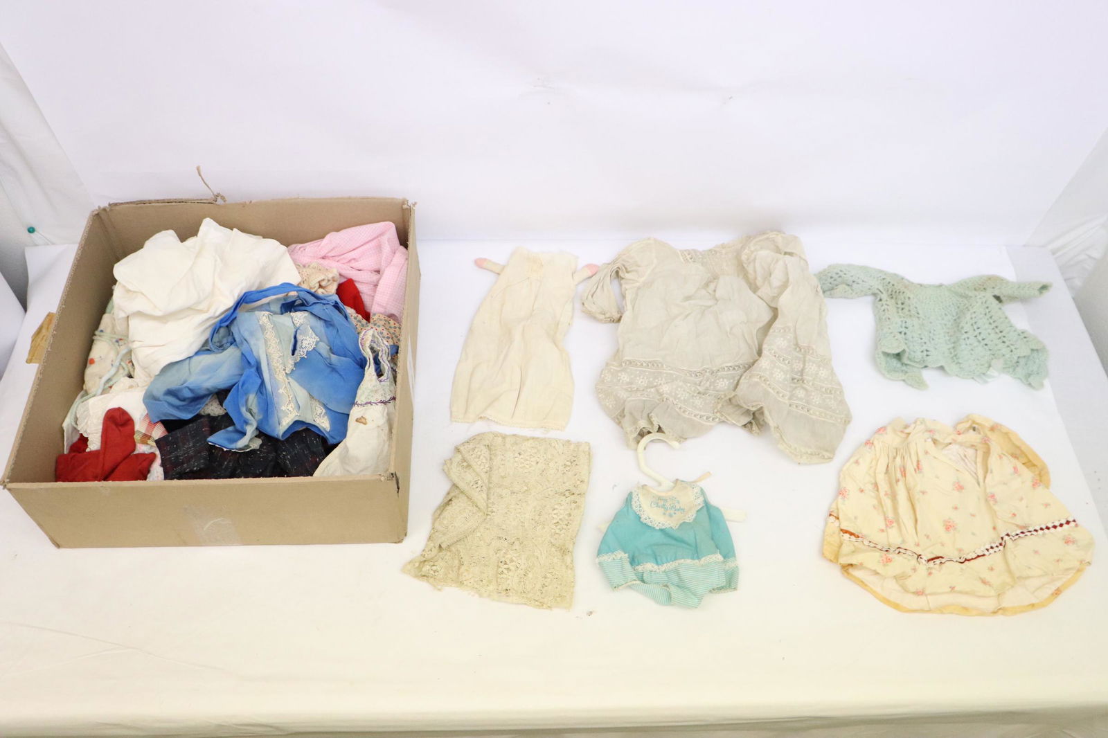 Lot of antique doll clothes (1 of 11)