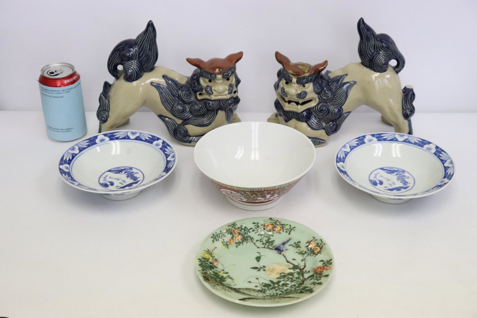 6 items: 3 Chinese porcelain bowls (3.1"Hx7.25"dia, 2.13"Hx7.05"dia(2)), antique Japanese porcelain plates (1.15"Hx7.25"dia) and 2 Japanese kutani fulion (one chip, 8.75"H each)