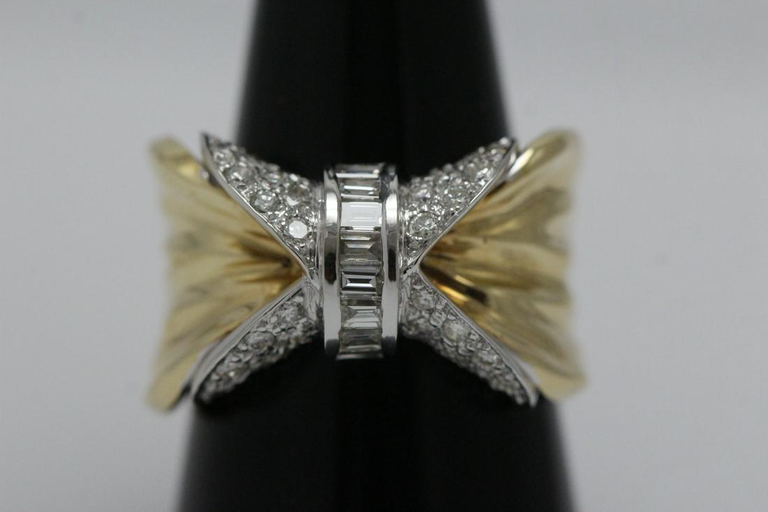 A beautiful 18K Y/G ring set with diamond (1 of 10)