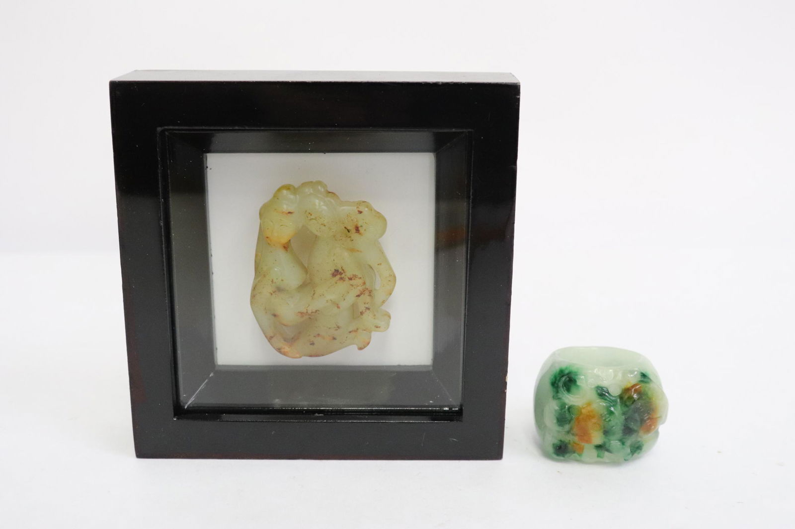 a stone carved bangle ring, & a jade carving in case (1 of 10)