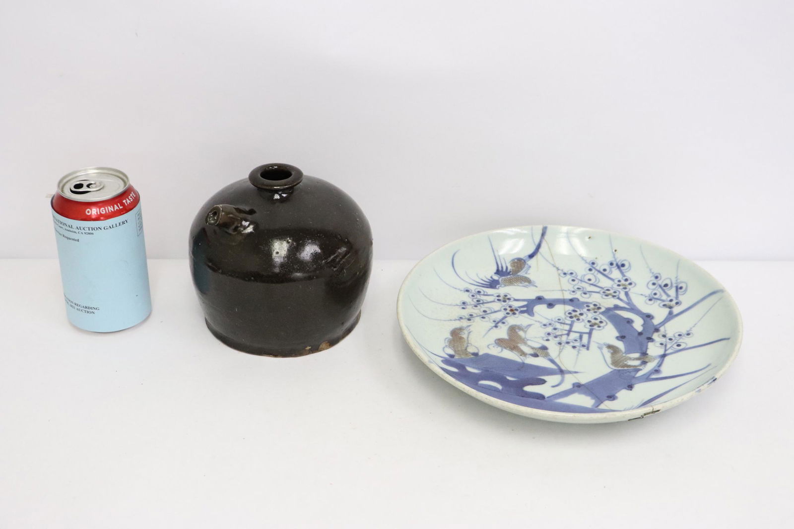 Chinese antique plate, and a brown glazed jar: Chinese antique blue, red and white plate (repair, 1.7"Hx10.5"dia), and a brown glazed jar (5.25"Hx5.6"dia)