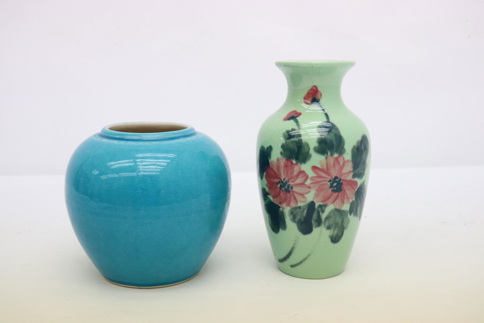 Chinese blue glazed jar and a porcelain vase (1 of 10)
