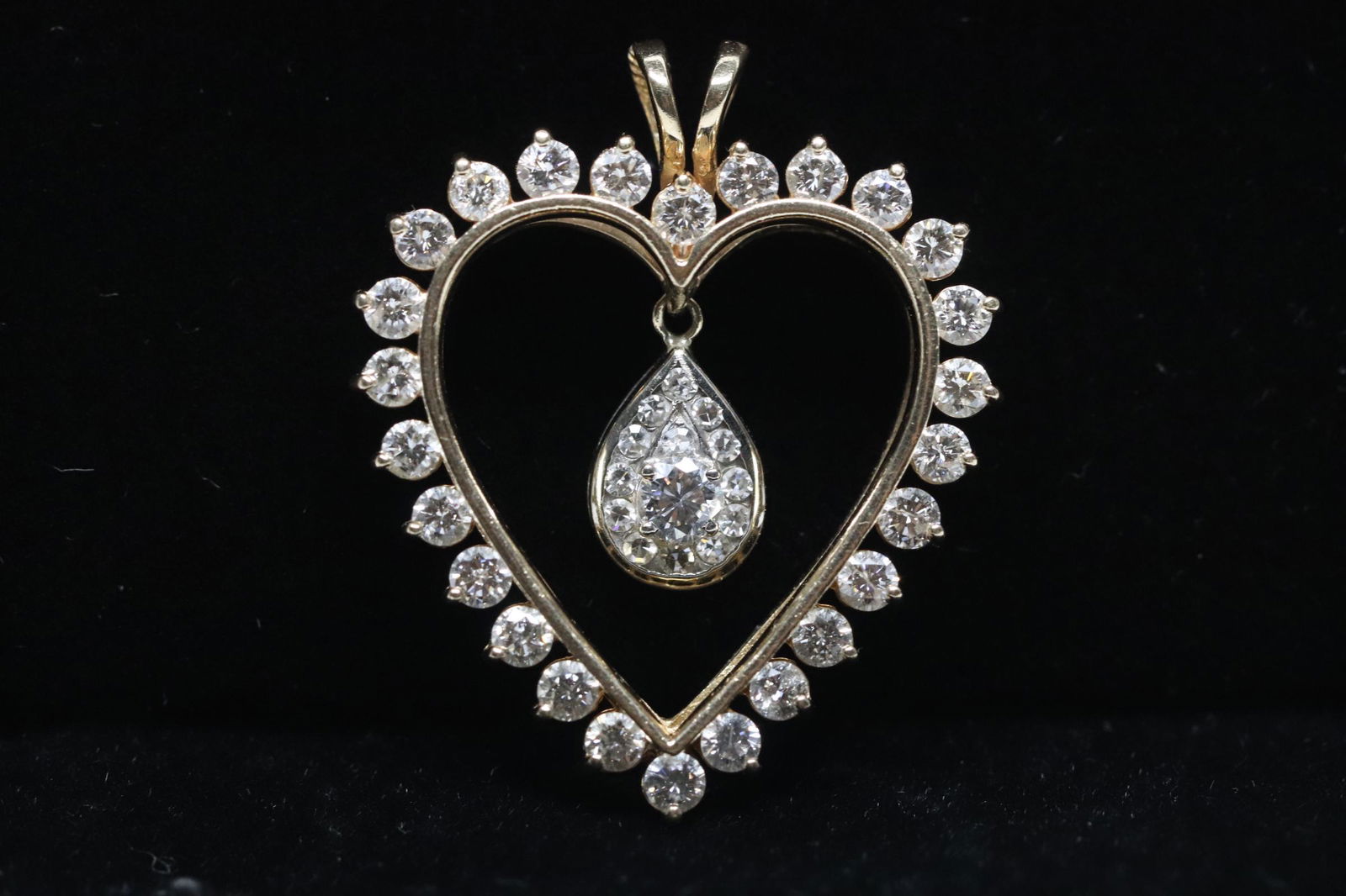 A large 14K Y/G heart shape diamond pendant (1 of 10)