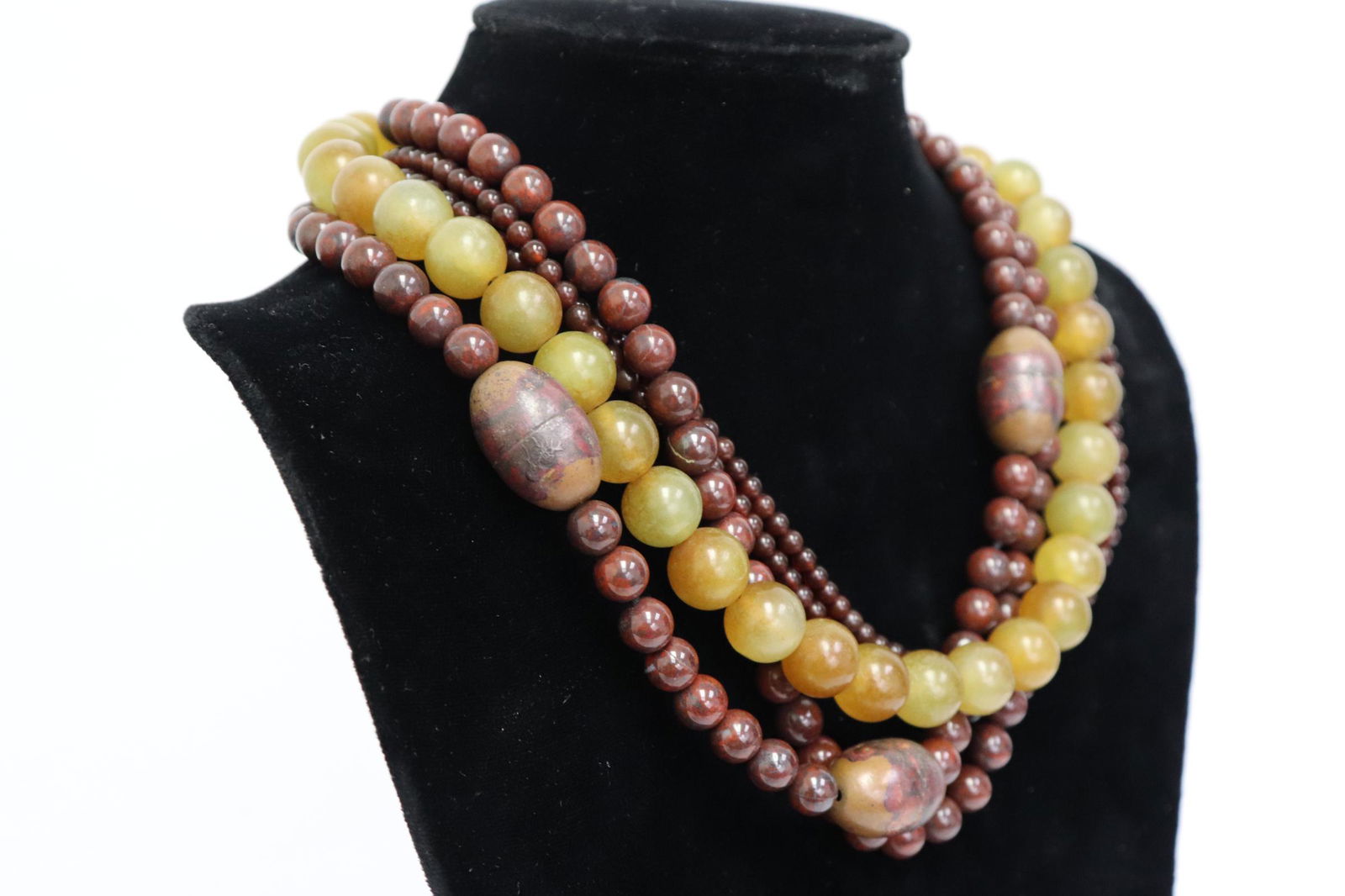 A multi-strand bead choker with agate, jasper beads: A multi-strand bead choker with agate, jasper beads