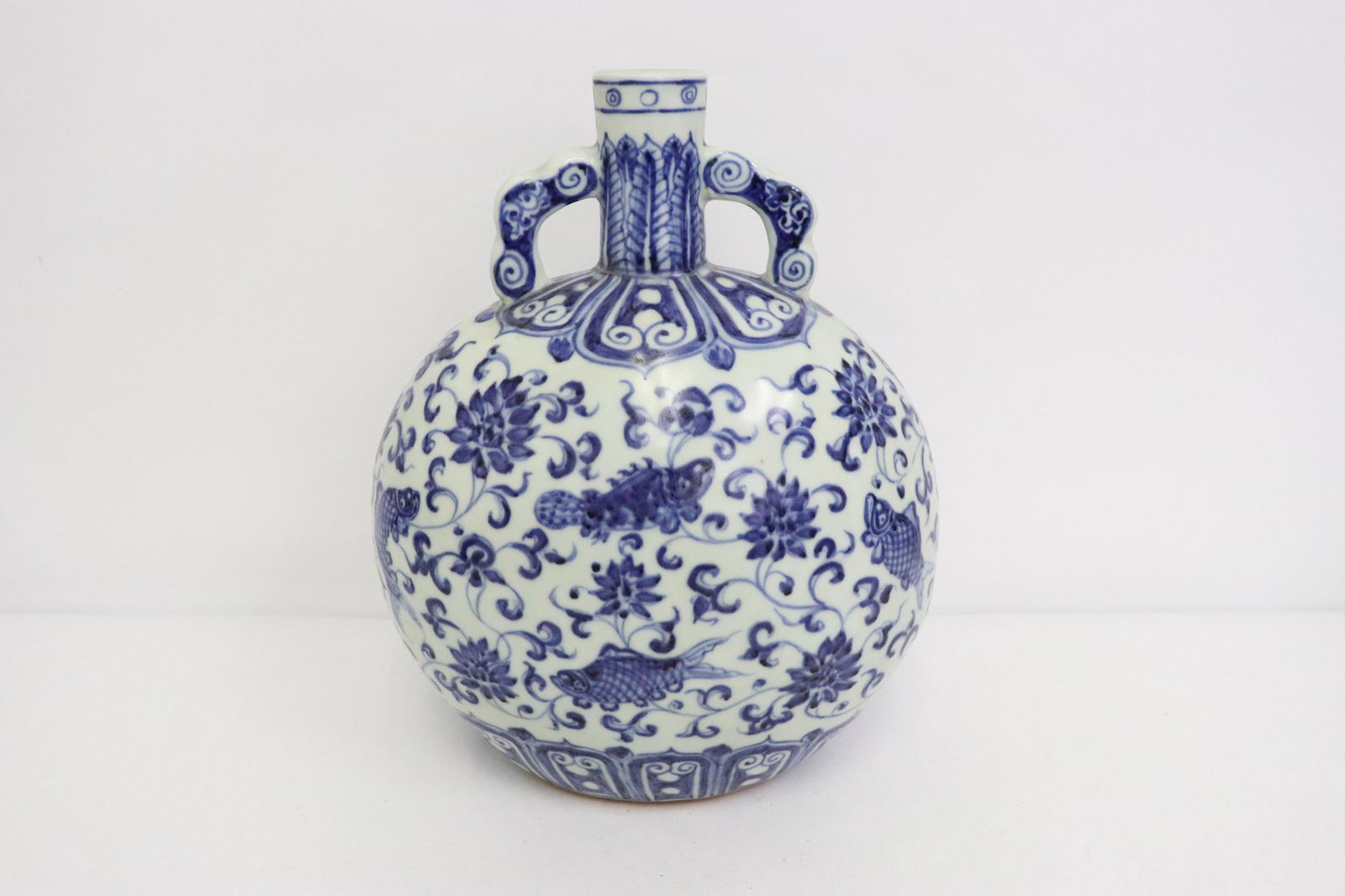Chinese vintage blue and white flask: Chinese vintage blue and white flask, 10.75"Hx8.2"x5.1"