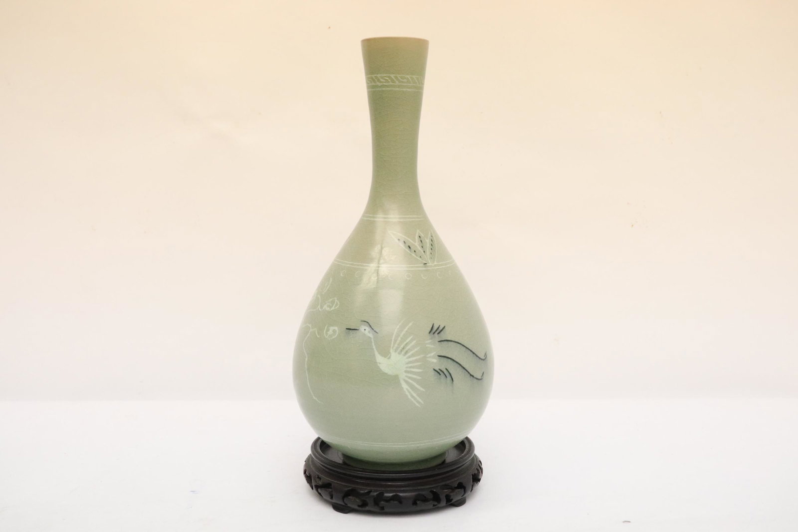 A Korean celadon porcelain vase: A Korean celadon porcelain vase, 10.9"Hx4.9"dia