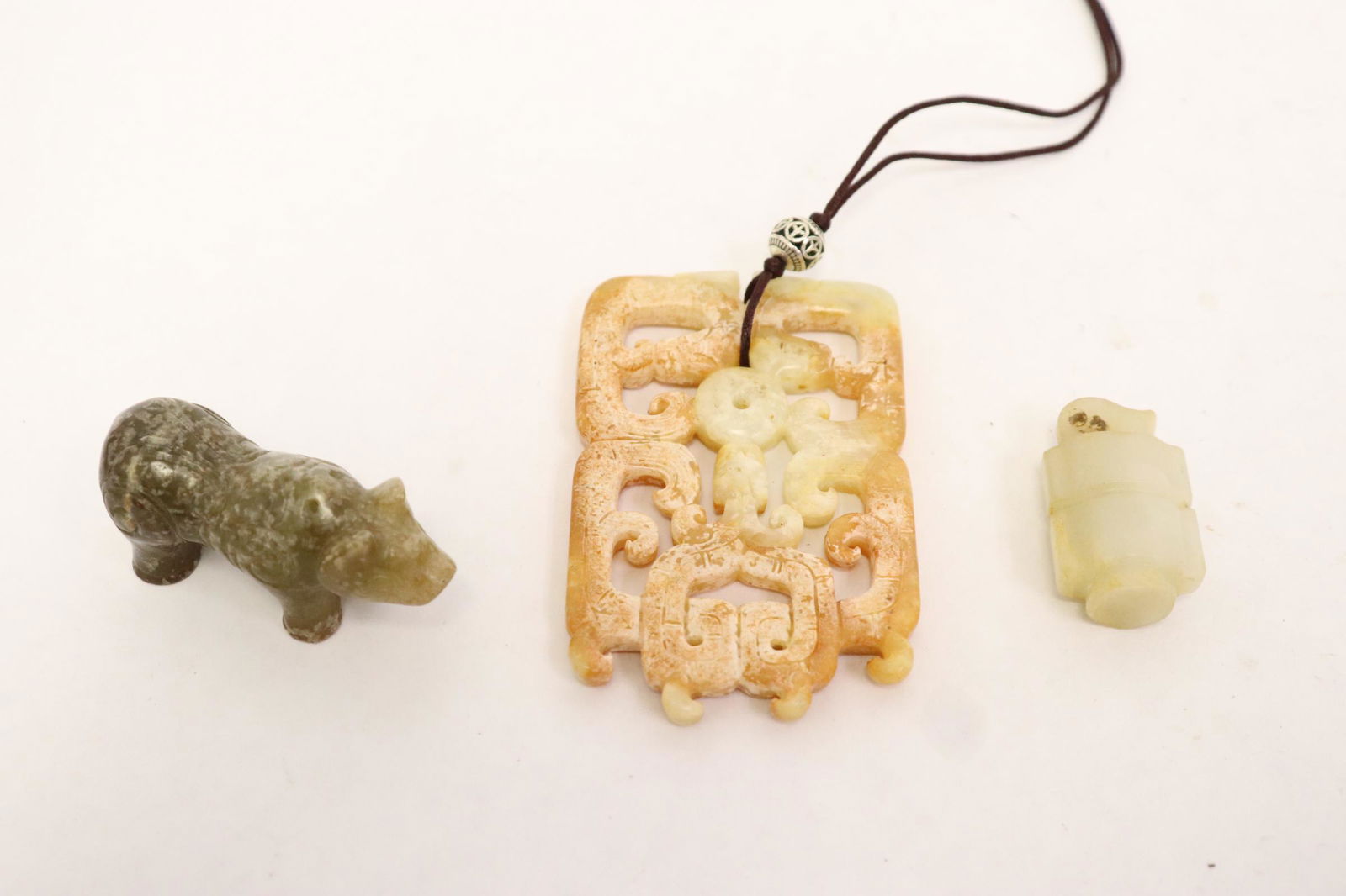 3 jade like stone ornaments (1 of 10)