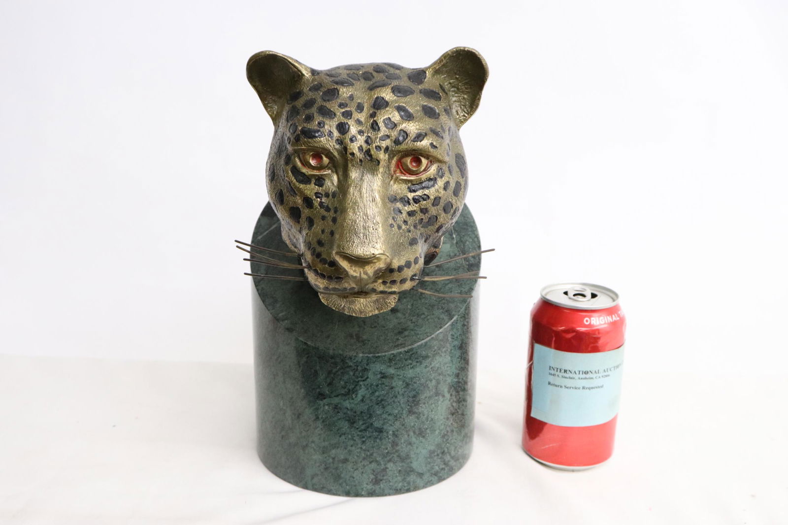 painted bronze sculpture on marble stand (1 of 10)