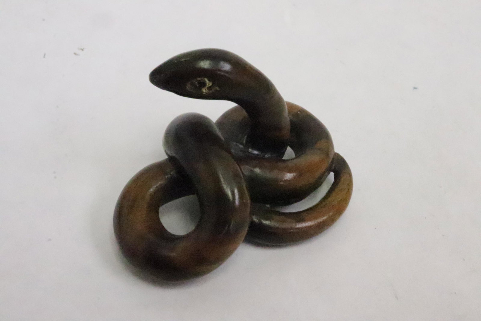 Japanese wood carved netsuke of snake: Japanese wood carved netsuke of snake, 1.35"x1.8"x1.15"