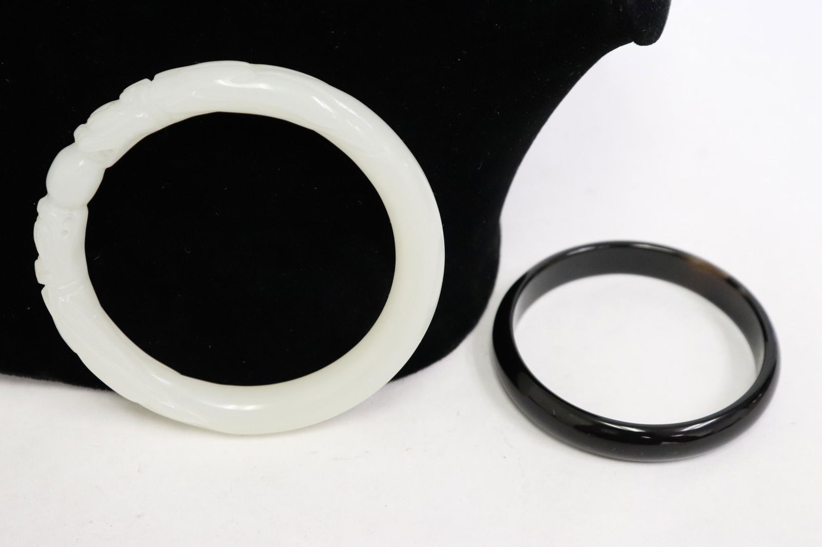 An agate like bangle & a white Peking glass bangle (1 of 9)