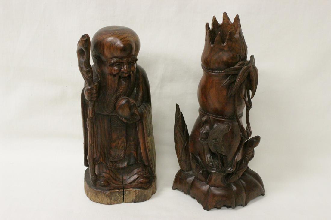 2 Chinese antique wood carvings: 2 Chinese antique wood carving; one depicting god of longevity (7.25"H) and one depicting bamboo motif vase (7.9"H)