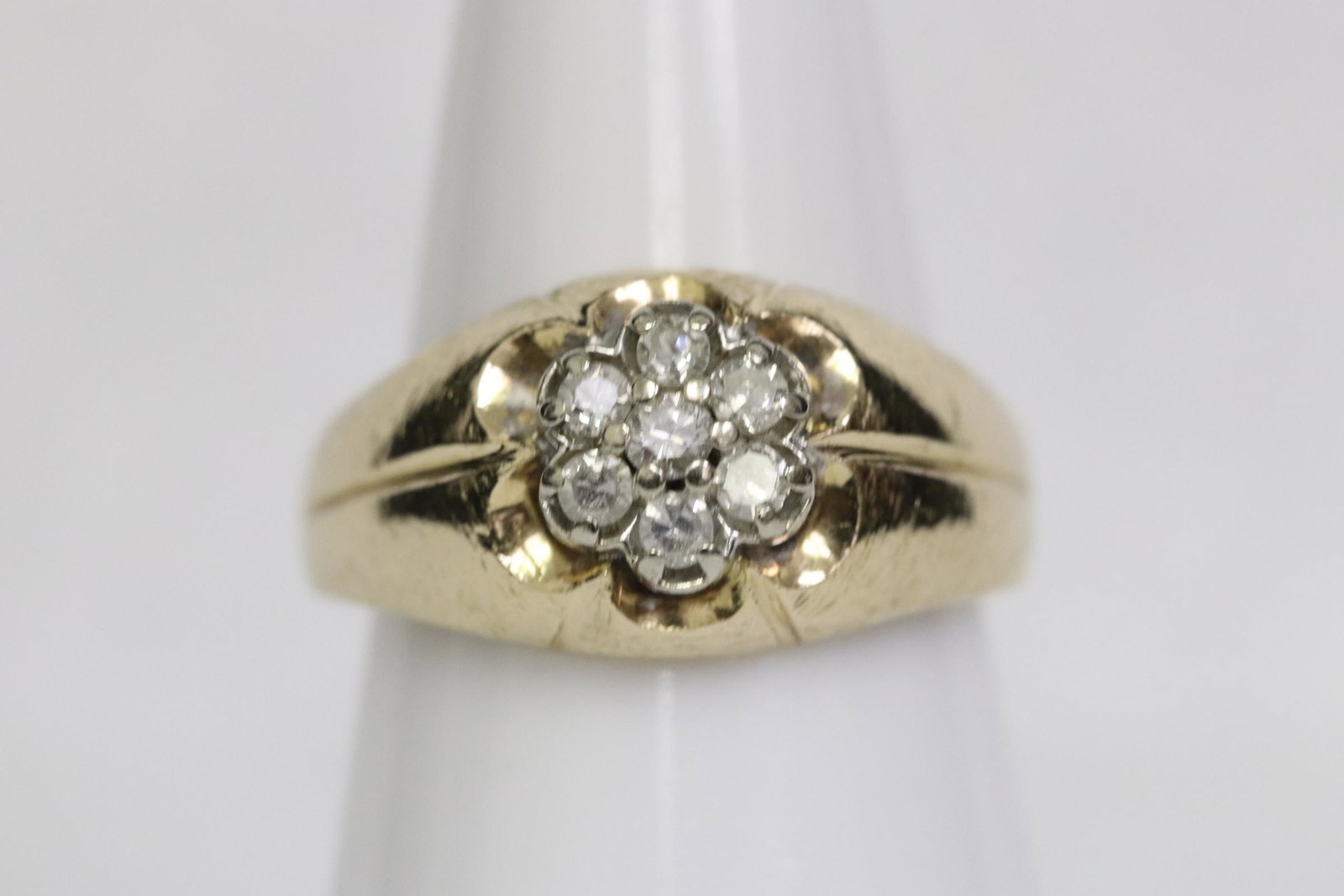 14K Y/G diamond ring: 14K Y/G ring, center 7 brilliant cut diamonds, tdw approx. 0.35ct, wt. 4.8gm, size 6