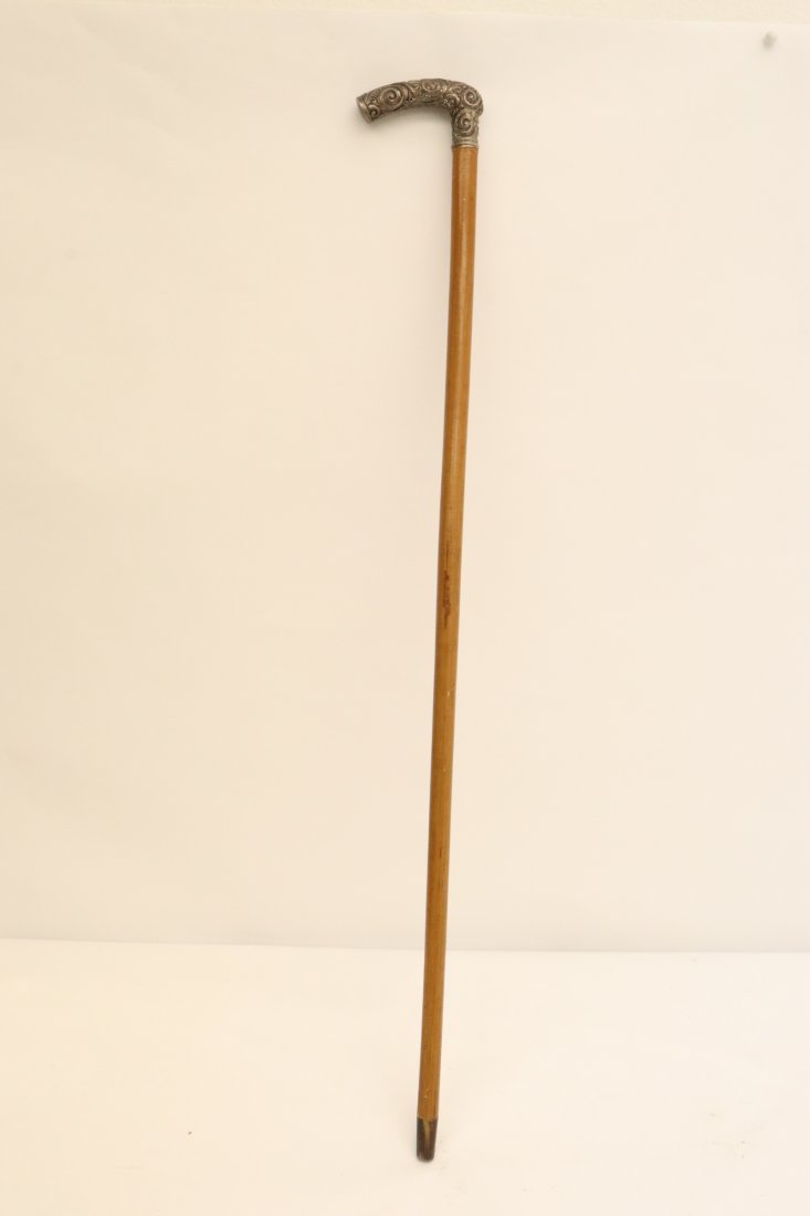 Antique cane with ornate sterling top (1 of 10)