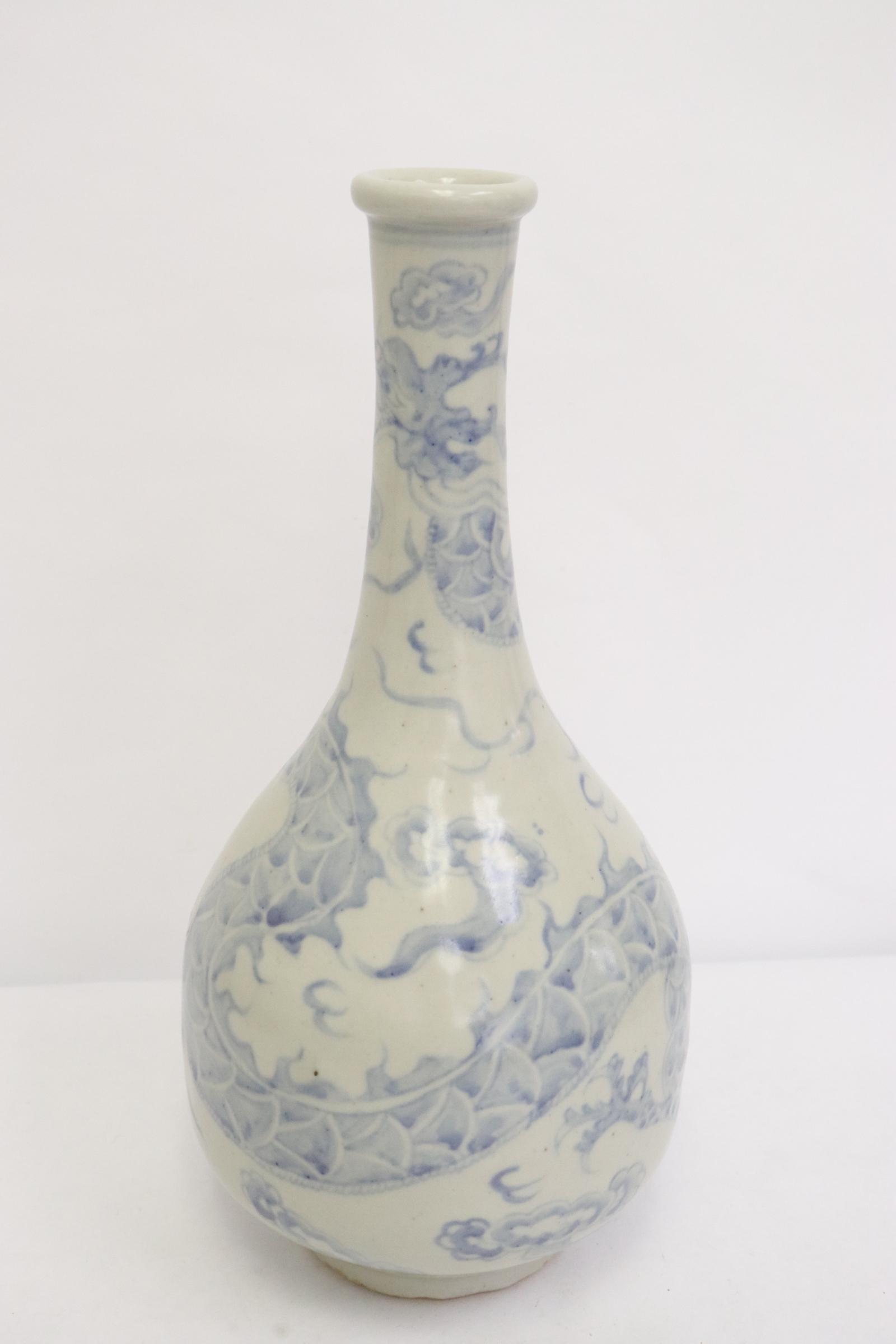 A vintage Korean blue and white porcelain vase: A vintage Korean blue and white porcelain vase, 12.35"Hx5.5"dia