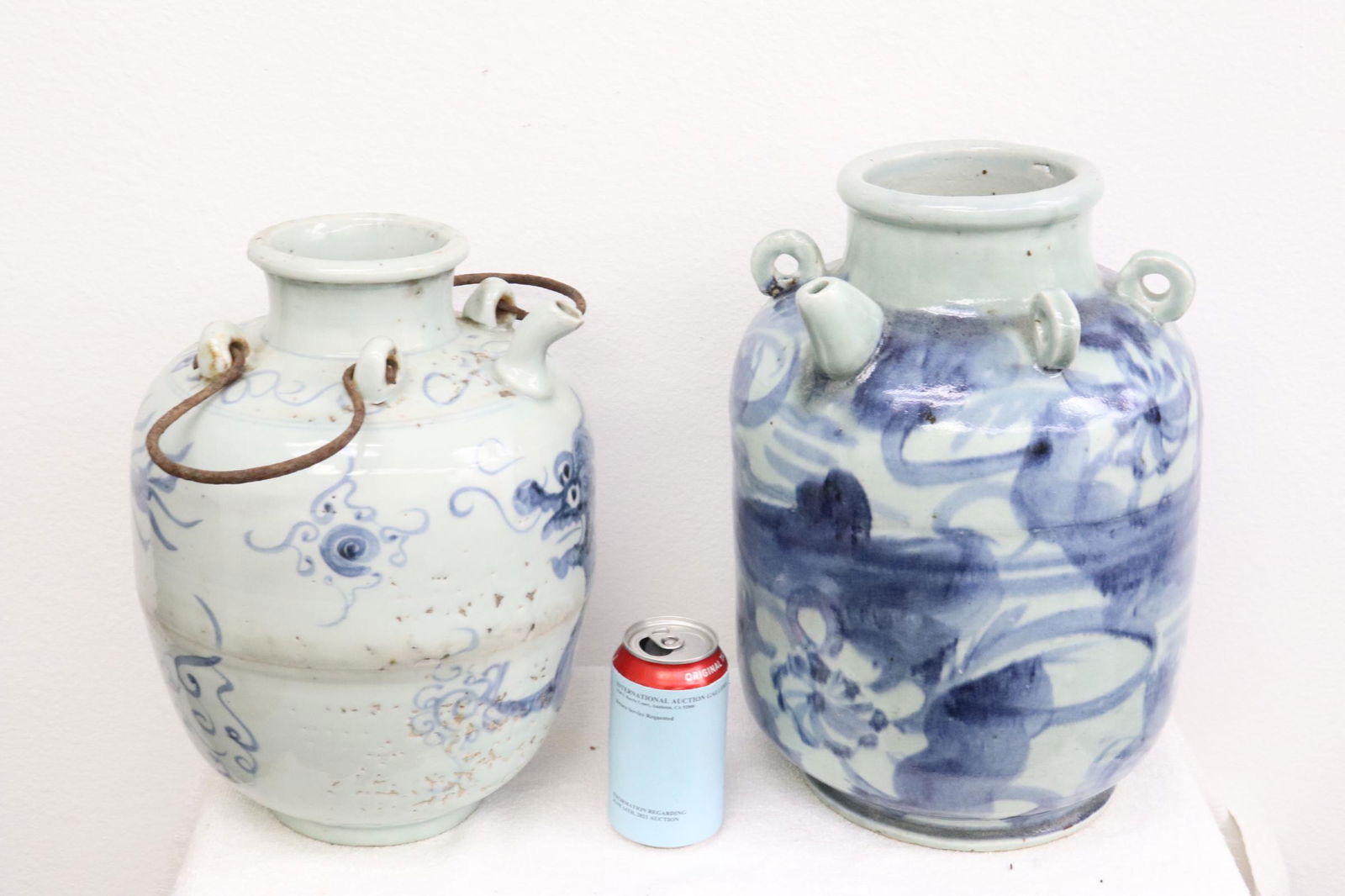 2 Chinese/ Korean antique b&w wine jar: 2 Chinese/ Korean antique blue and white wine jar, one has minor chip, 15.25"Hx9.5"dia, 15.25"Hx10.5"dia